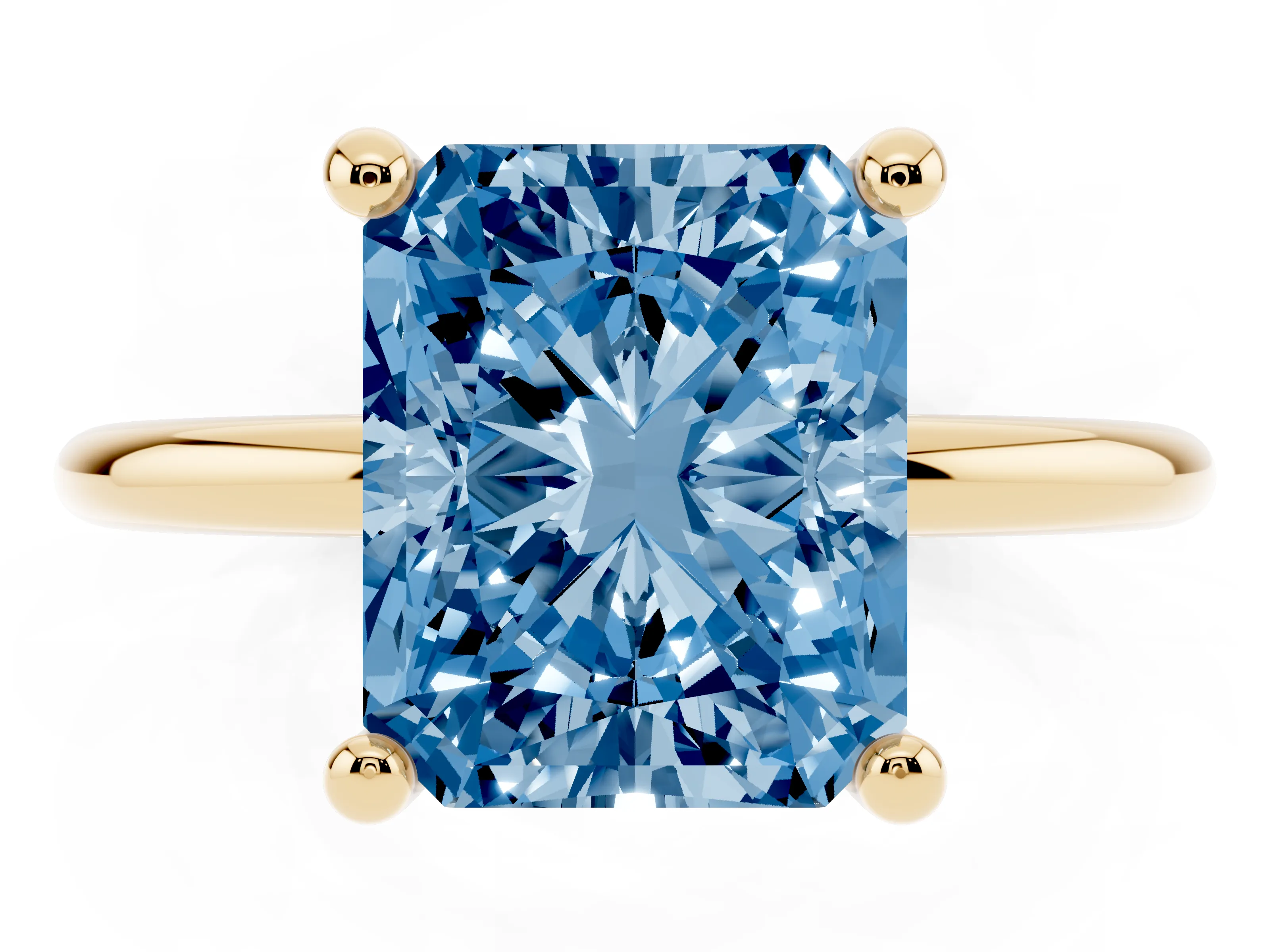 Fancy Blue Radiant Cut Diamond Solitaire Ring Set in Yellow gold with Secure Prong Setting on a Classic Band