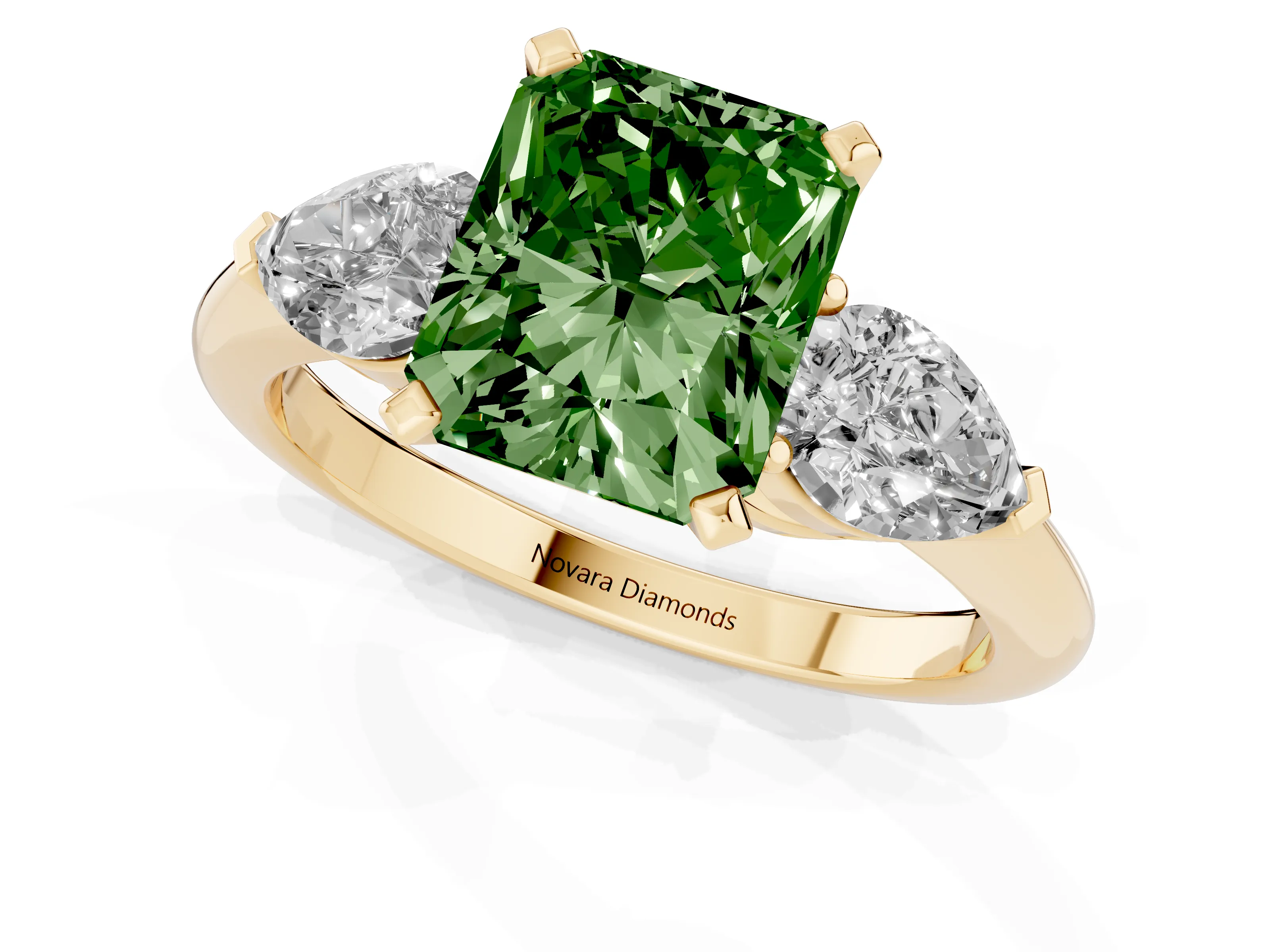 Fancy Green Three-Stone Radiant Cut Diamond Ring Set in Yellow gold with Pear Side Stones and Prong Setting