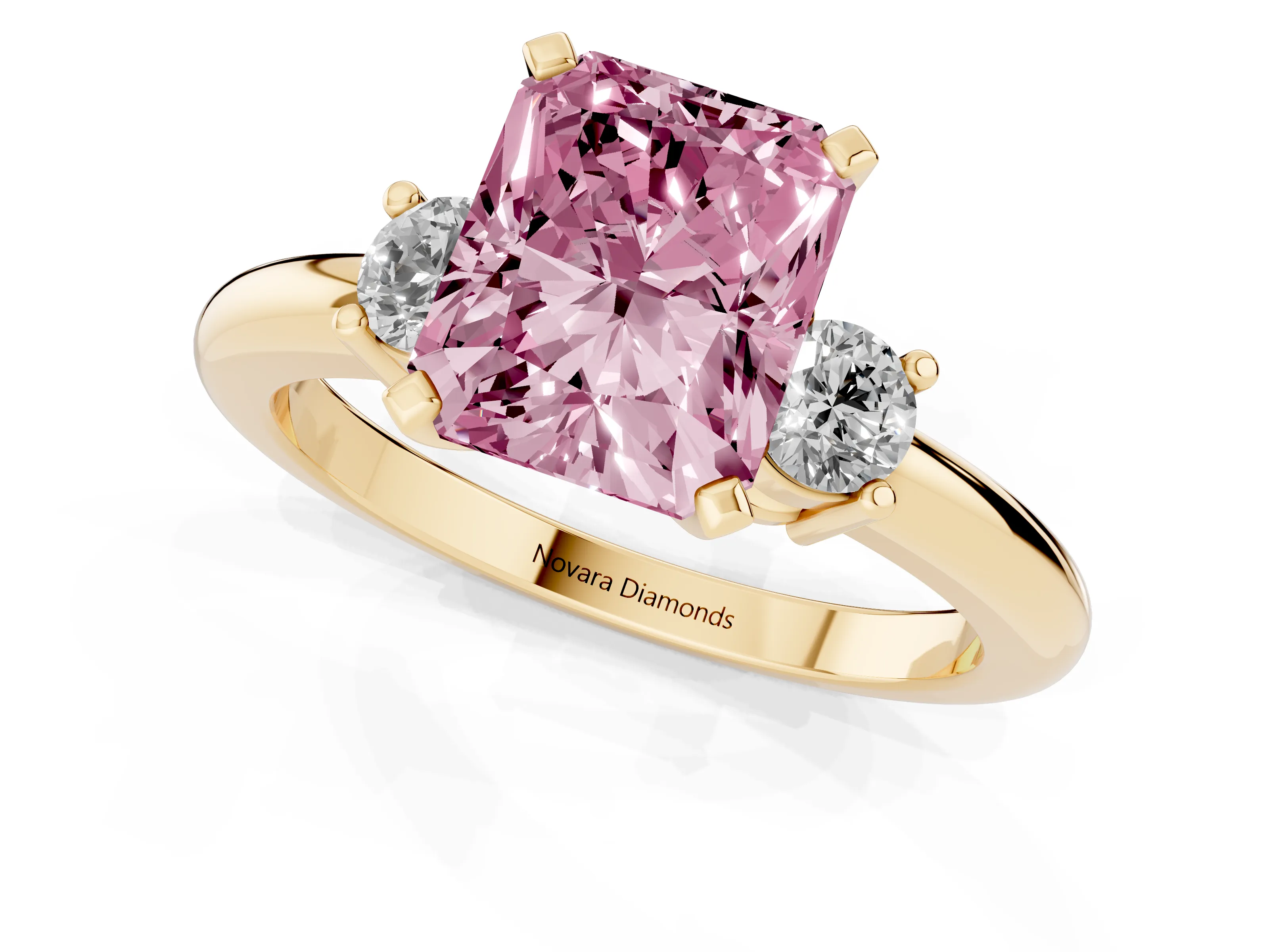 Fancy Pink Three-Stone Radiant Cut Diamond Ring Set in Yellow gold with Prong Setting and Plain Band