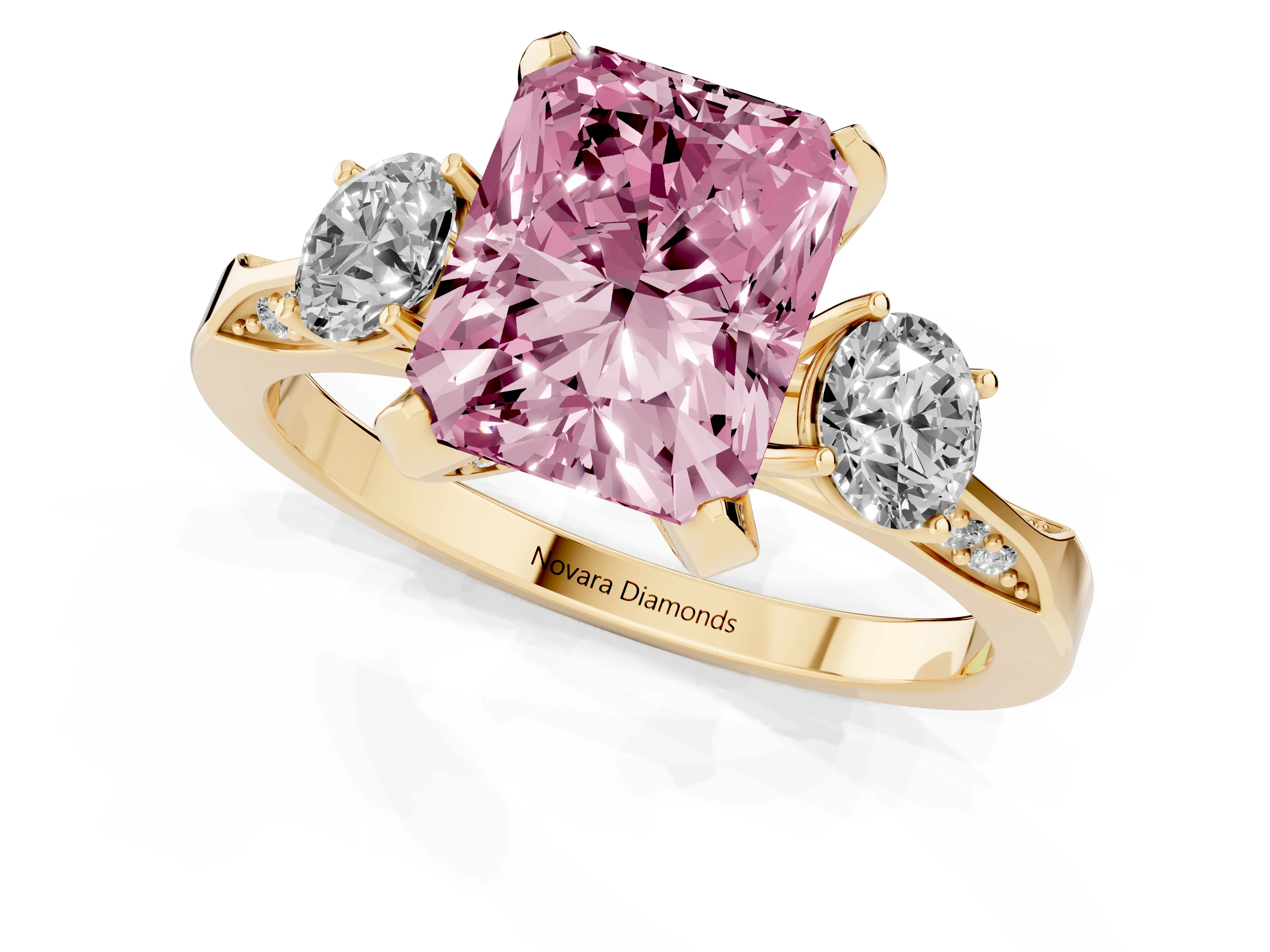 Fancy Pink Radiant Cut Diamond Three-Stone Ring Set in Yellow gold with Pavé Band and Smaller Side Stones
