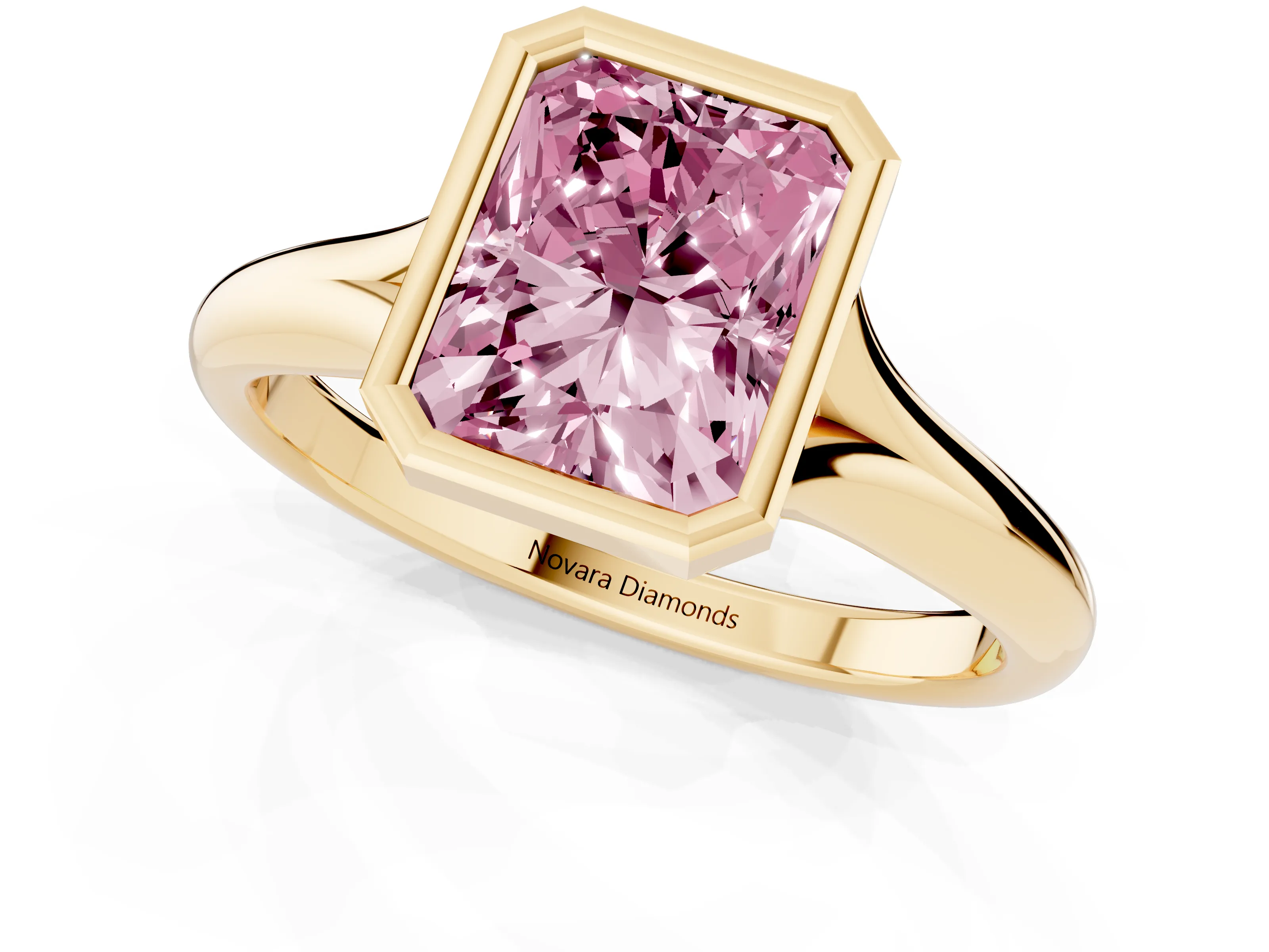 Fancy Pink Bezel Set Radiant Cut Diamond Solitaire Ring Set in Yellow gold with Smooth Band