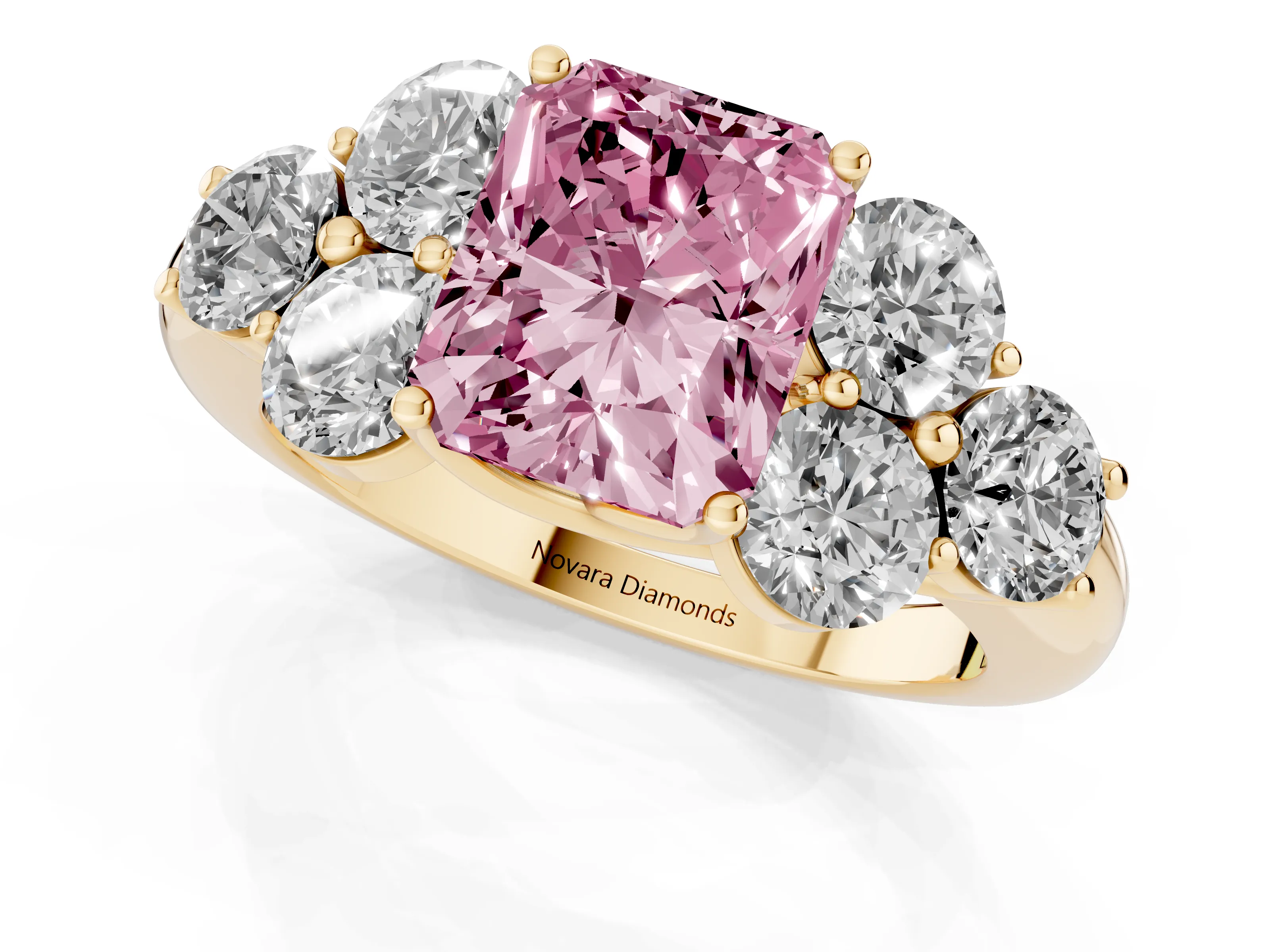 Fancy Pink Radiant Cut Diamond Cluster Ring Set in Yellow gold with Round Accent Stones and Prong Setting on a Plain Band