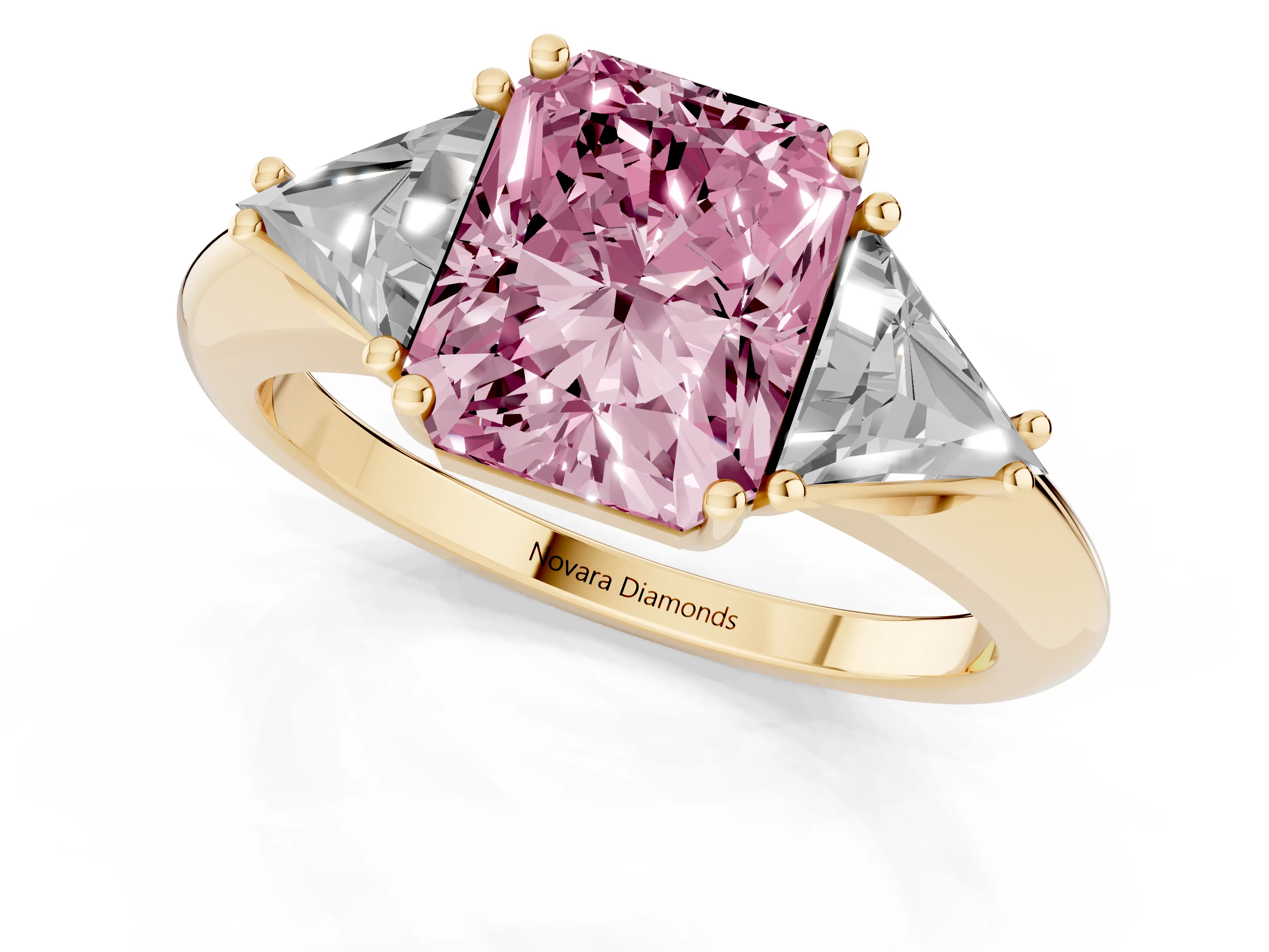 Fancy Pink Radiant Cut Diamond Three-Stone Engagement Ring Set in Yellow gold with Trillion Side Stones