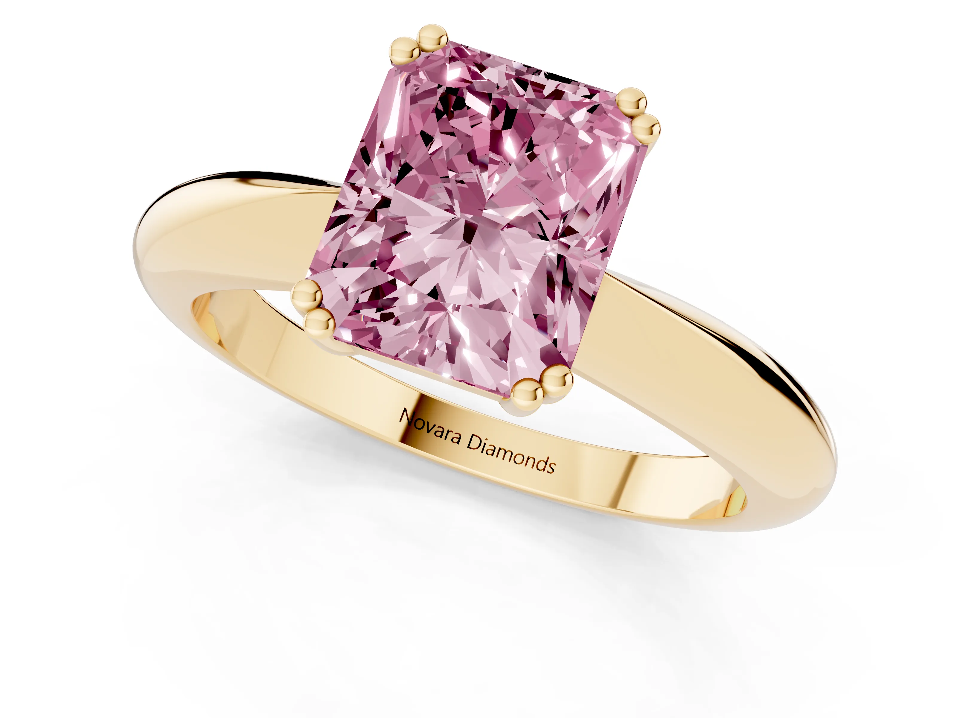 Fancy Pink Radiant Cut Diamond Solitaire Engagement Ring Set in Yellow gold with Tapered Band and Prong Setting
