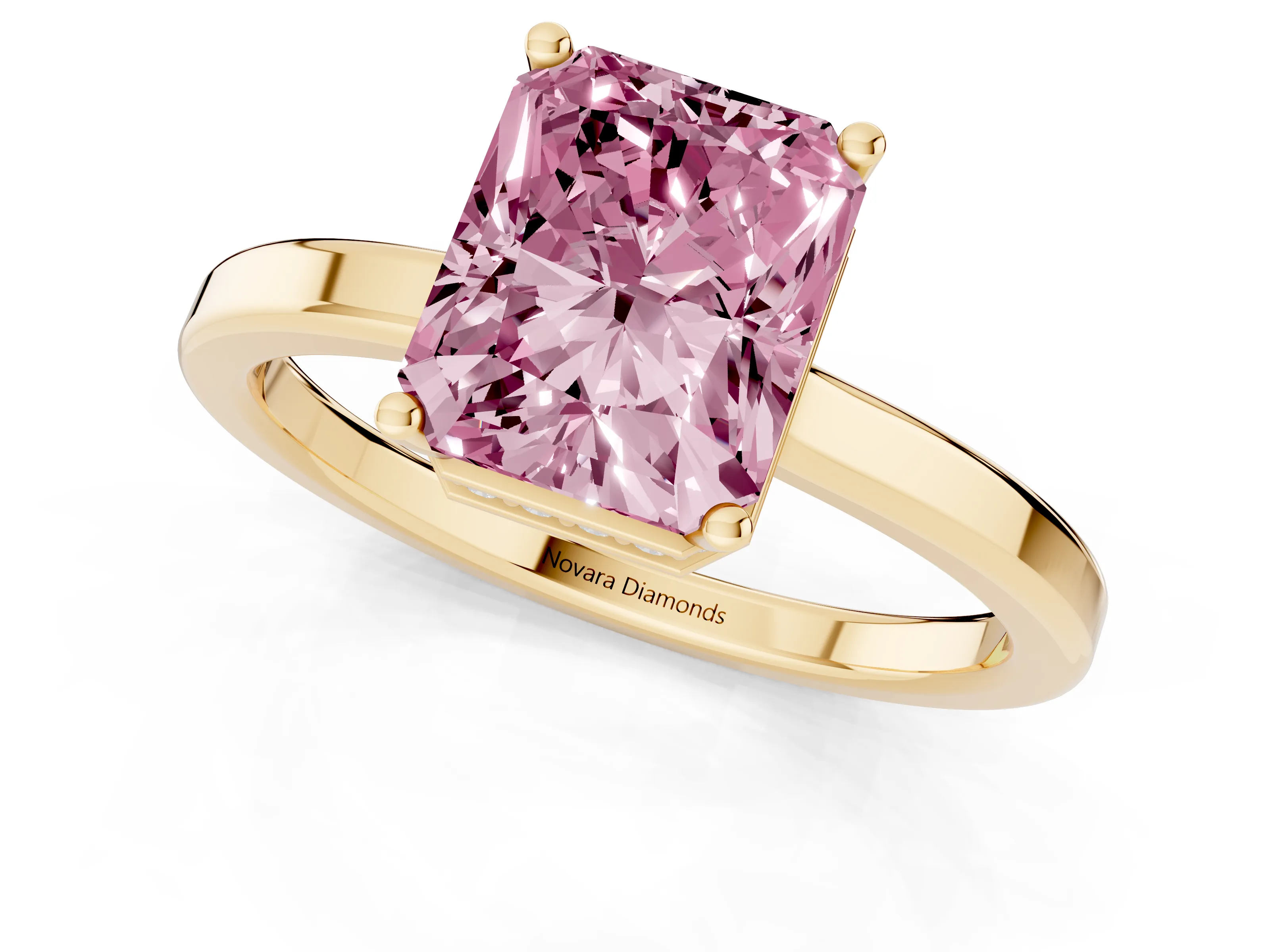 Fancy Pink Radiant Cut Diamond Solitaire Engagement Ring Set in Yellow gold with Prong Setting on a Plain Band