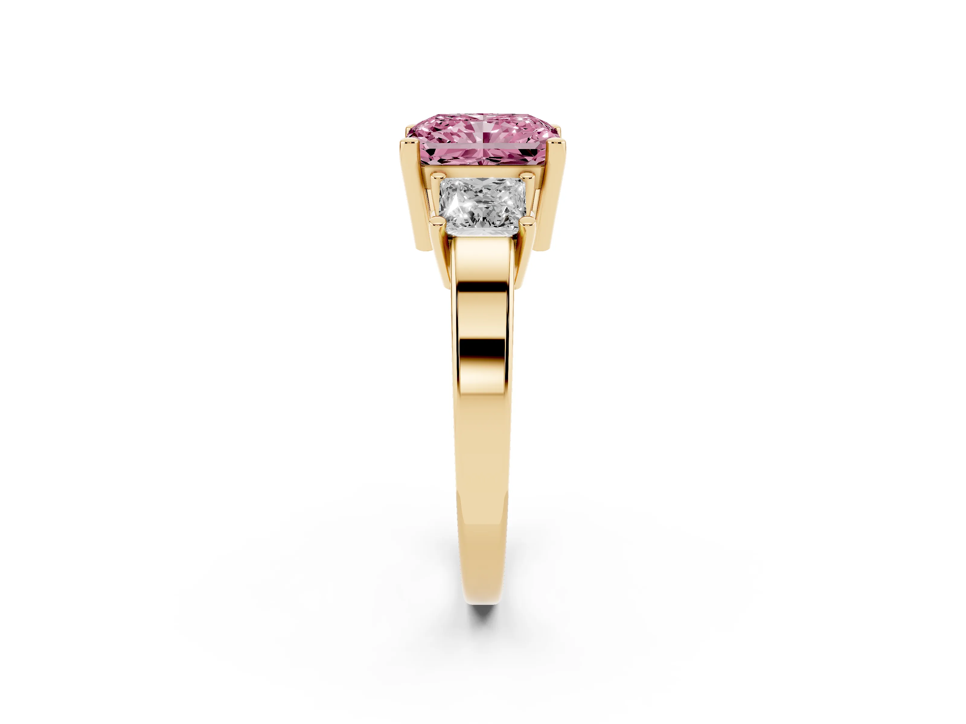 Fancy Pink Three-Stone Radiant Cut Diamond Solitaire Ring Set in Yellow gold with Prong Setting