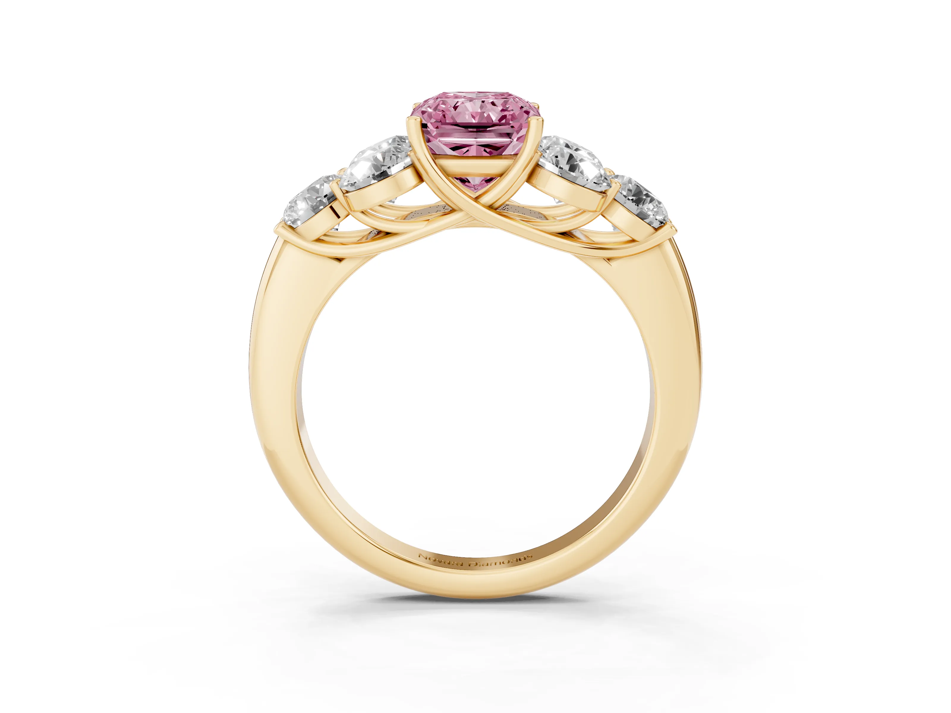 Fancy Pink Radiant Cut Diamond Cluster Ring Set in Yellow gold with Round Accent Stones and Prong Setting on a Plain Band