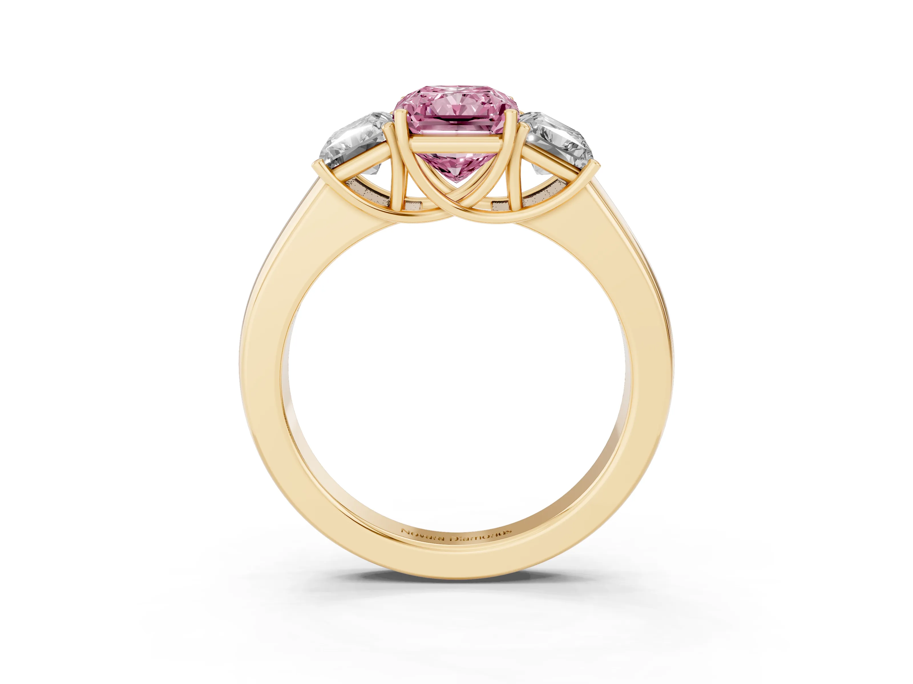 Fancy Pink Three-Stone Radiant Cut Diamond Ring Set in Yellow gold with Matching Prong Settings and Plain Band