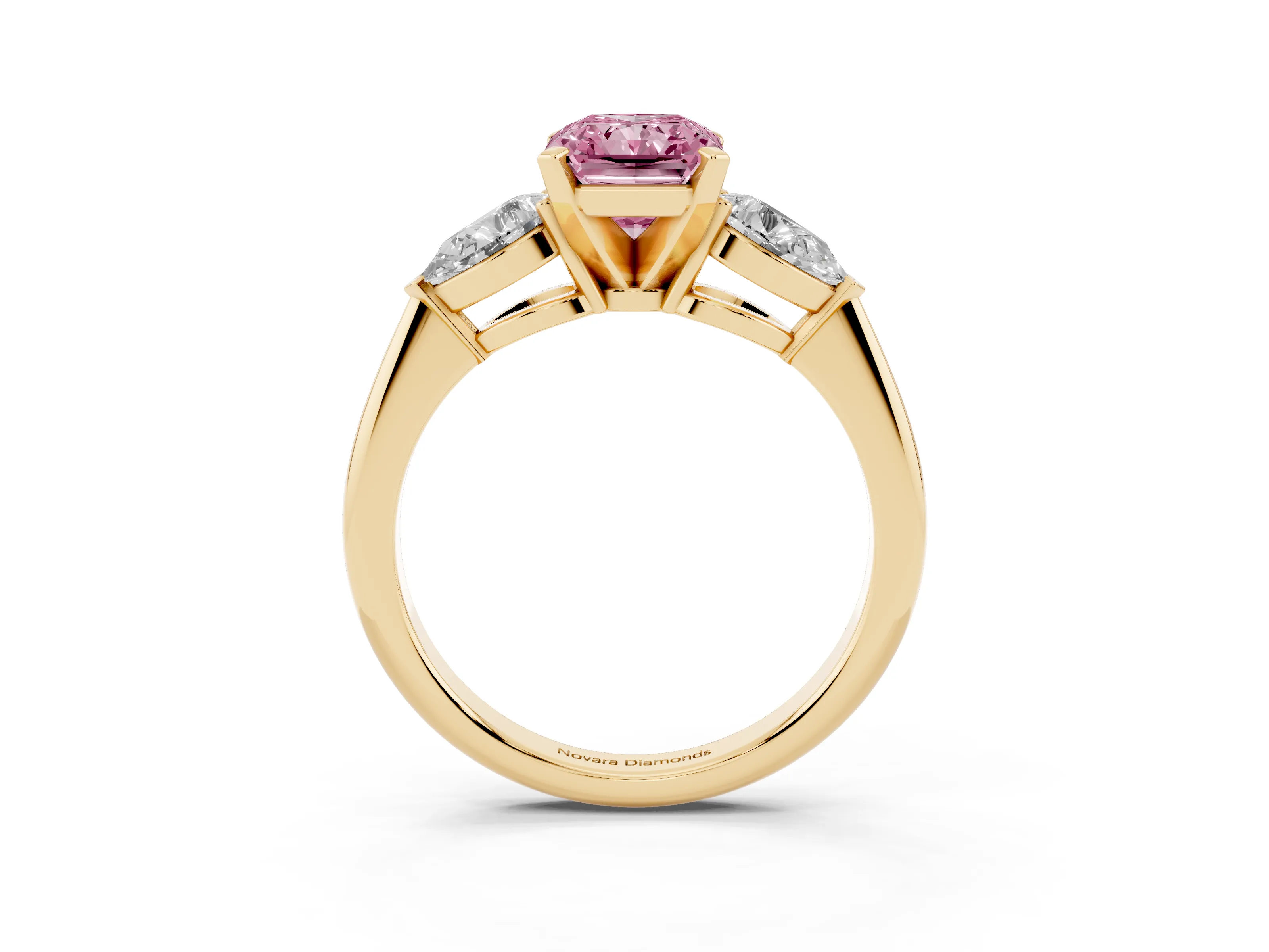 Fancy Pink Three-Stone Radiant Cut Diamond Ring Set in Yellow gold with Pear Side Stones and Prong Setting
