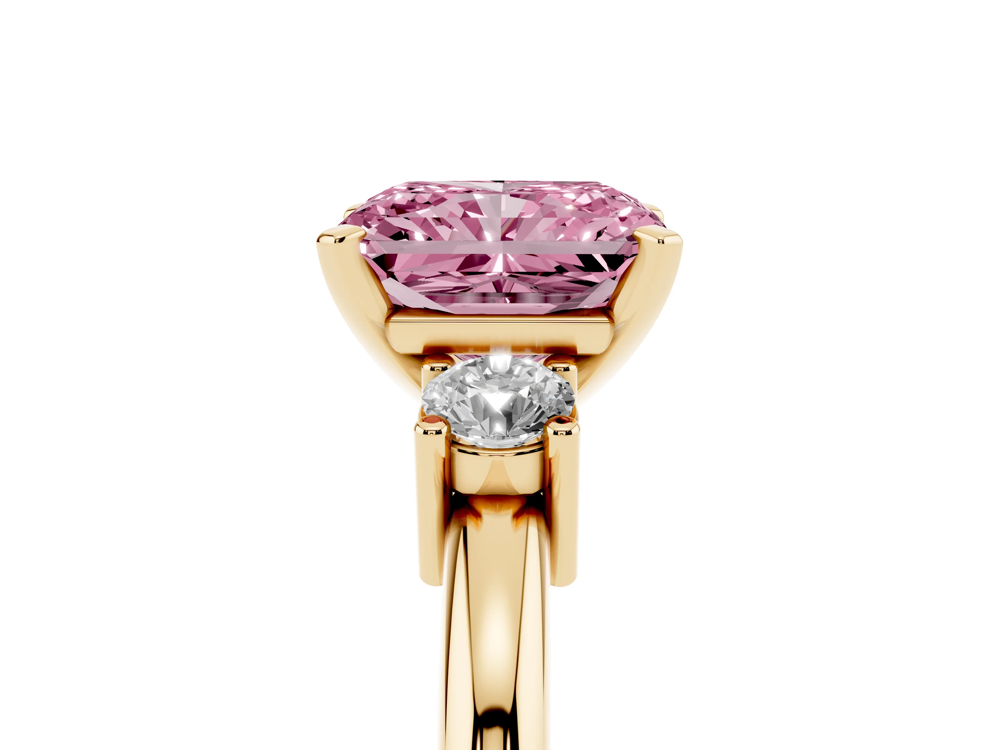 Fancy Pink Three-Stone Radiant Cut Diamond Ring Set in Yellow gold with Prong Setting and Plain Band