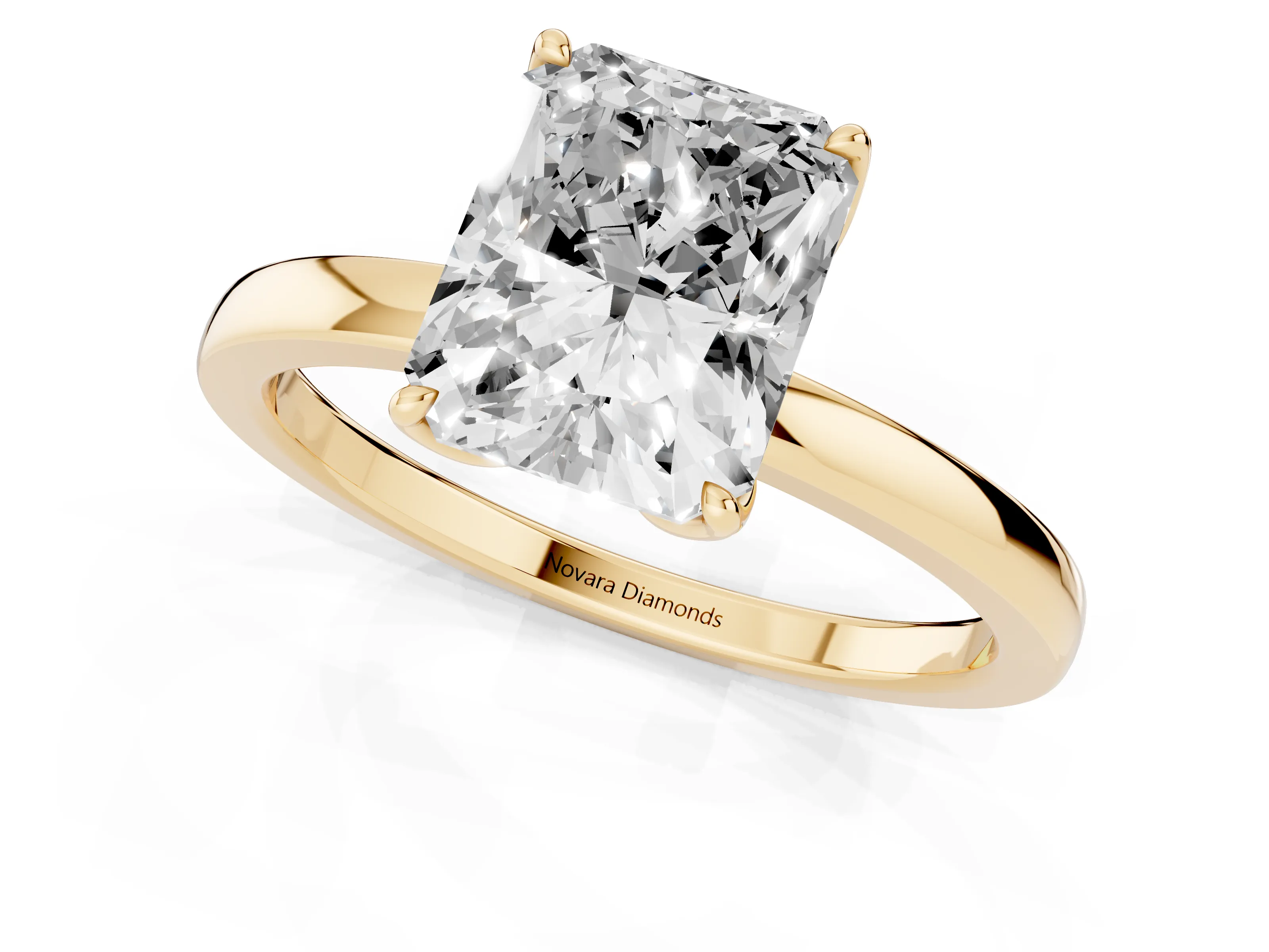 Radiant Cut Diamond Solitaire Ring Set in Yellow gold with Prong Setting and Thin Polished Band