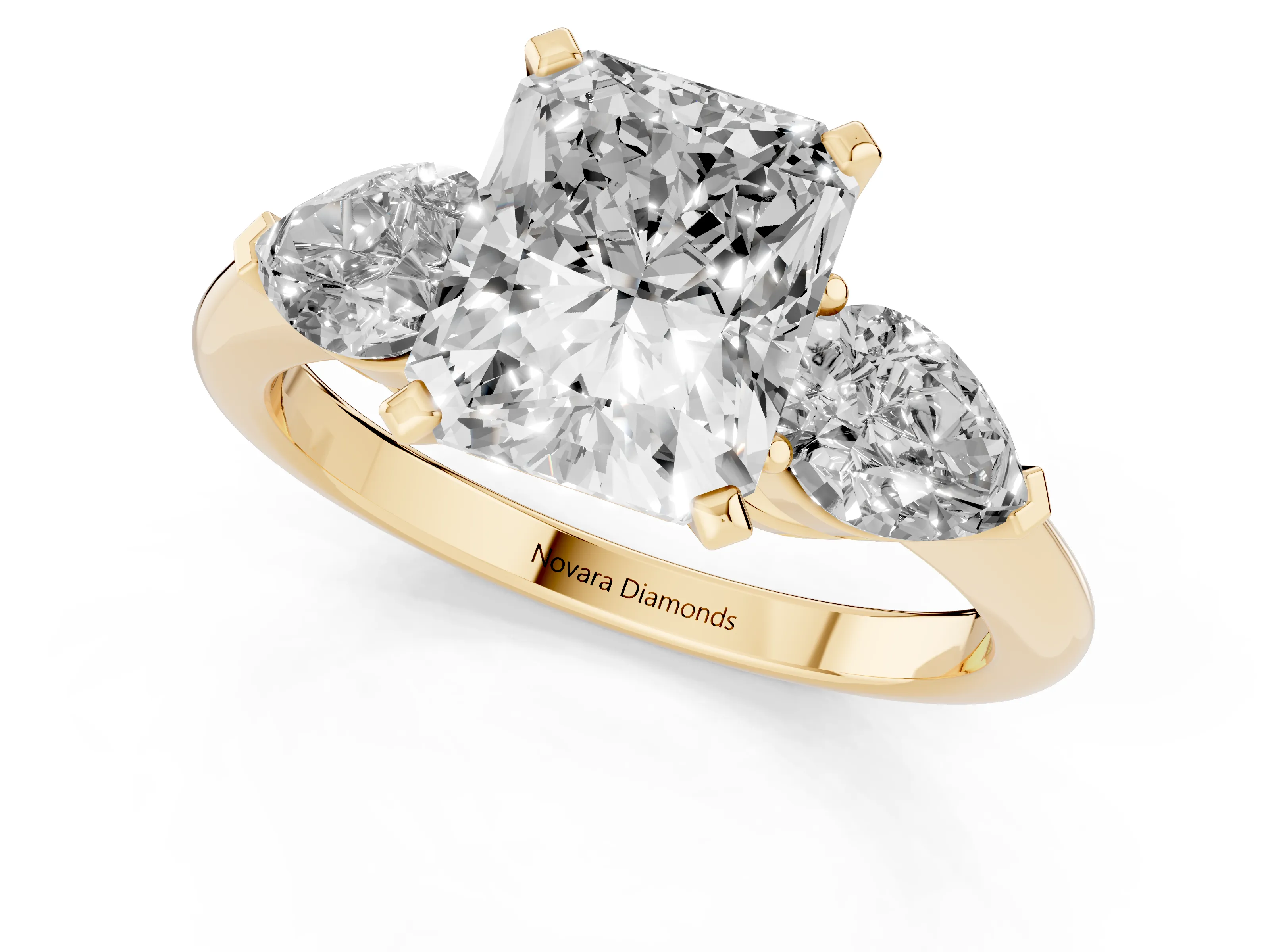 Three-Stone Radiant Cut Diamond Ring Set in Yellow gold with Pear Side Stones and Prong Setting – second view