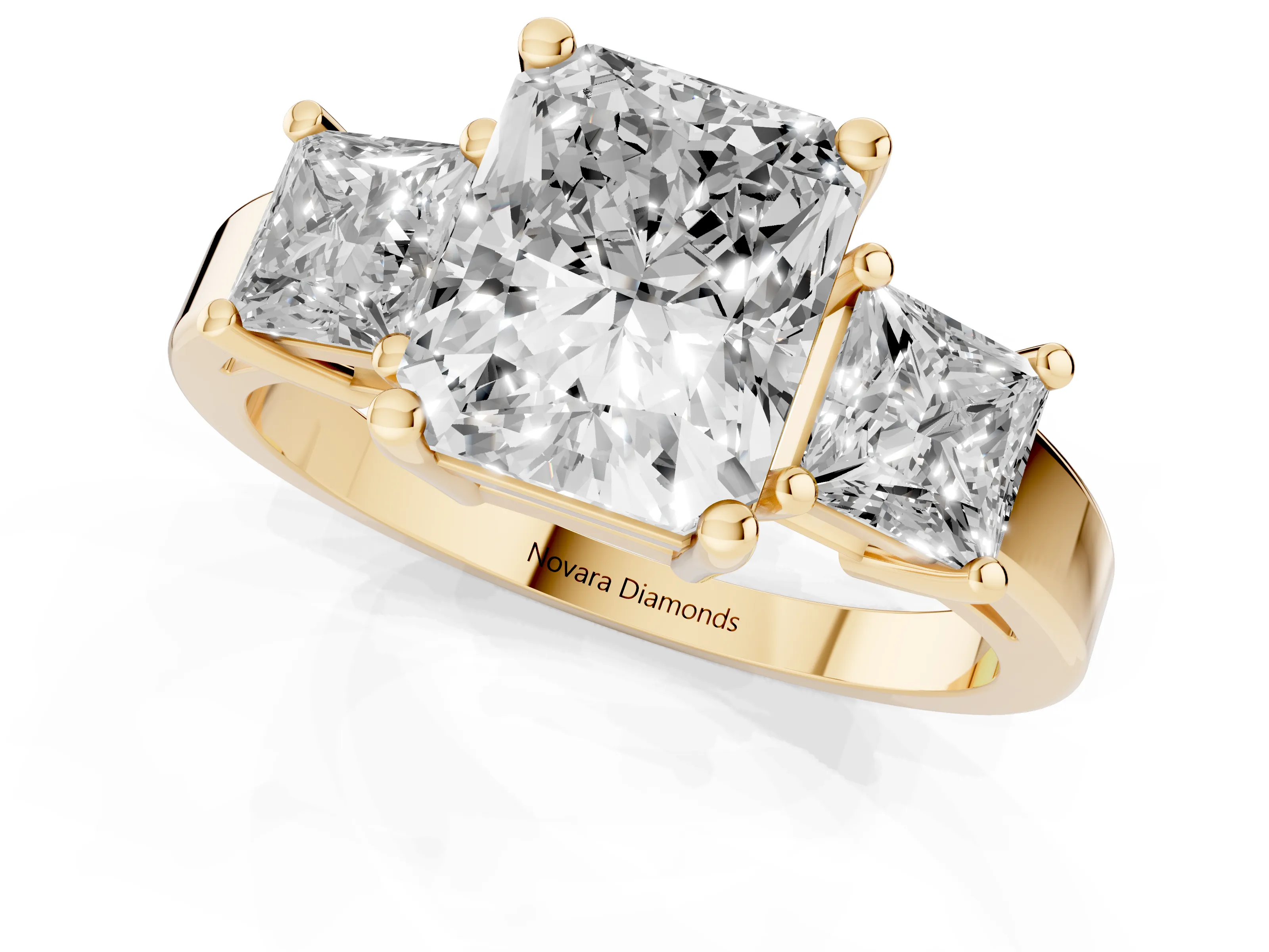 Three-Stone Radiant Cut Diamond Solitaire Ring Set in Yellow gold with Prong Setting