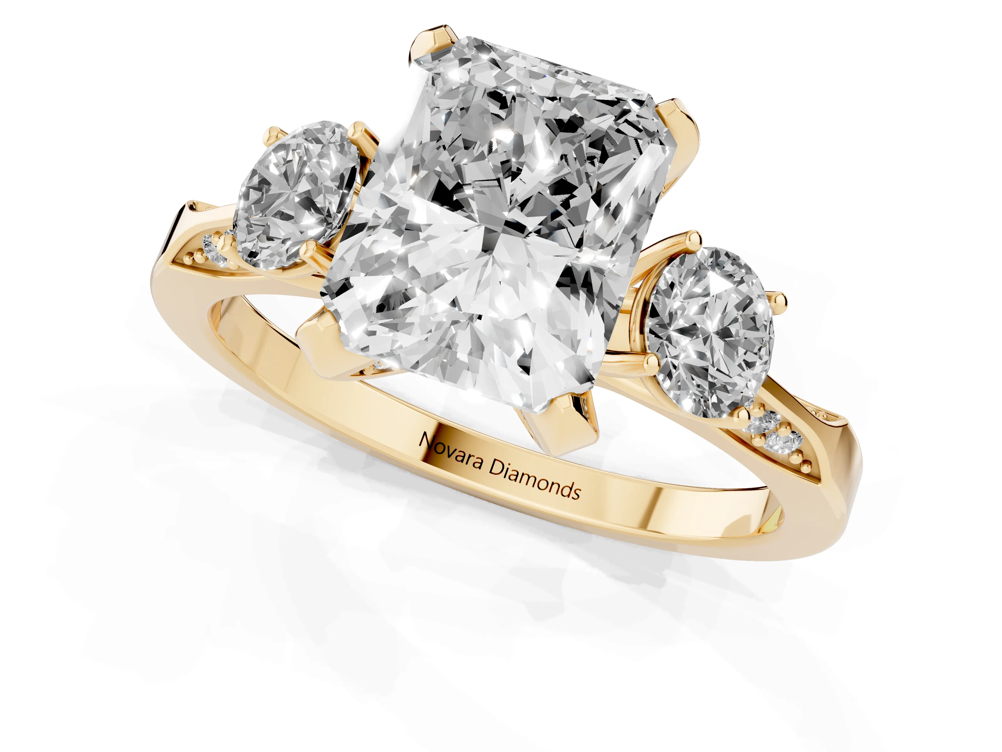 Radiant Cut Diamond Three-Stone Ring Set in Yellow gold with Pavé Band and Smaller Side Stones