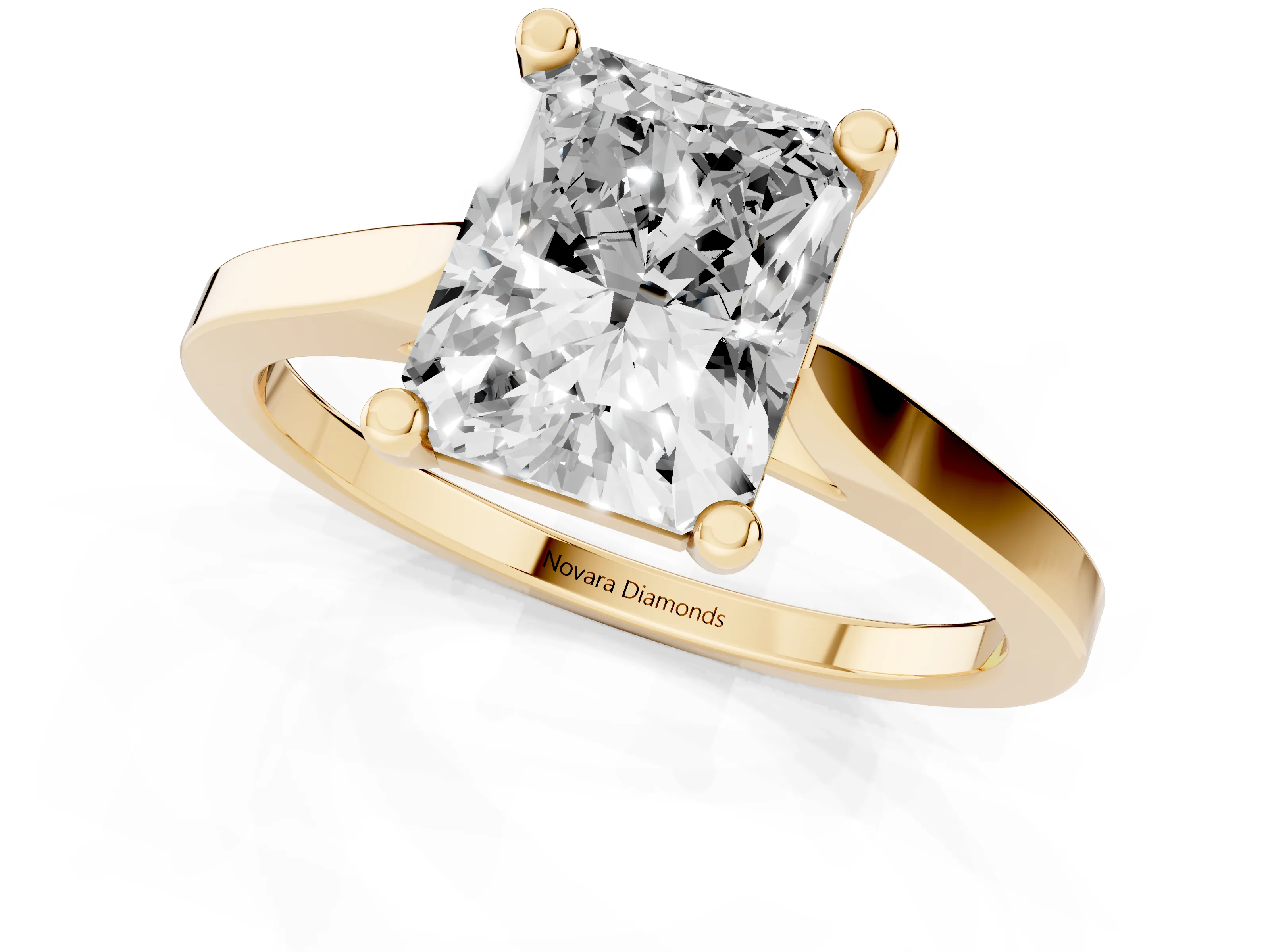 Radiant Cut Diamond Solitaire Ring Set in Yellow gold with Prong Setting and Tapered Band