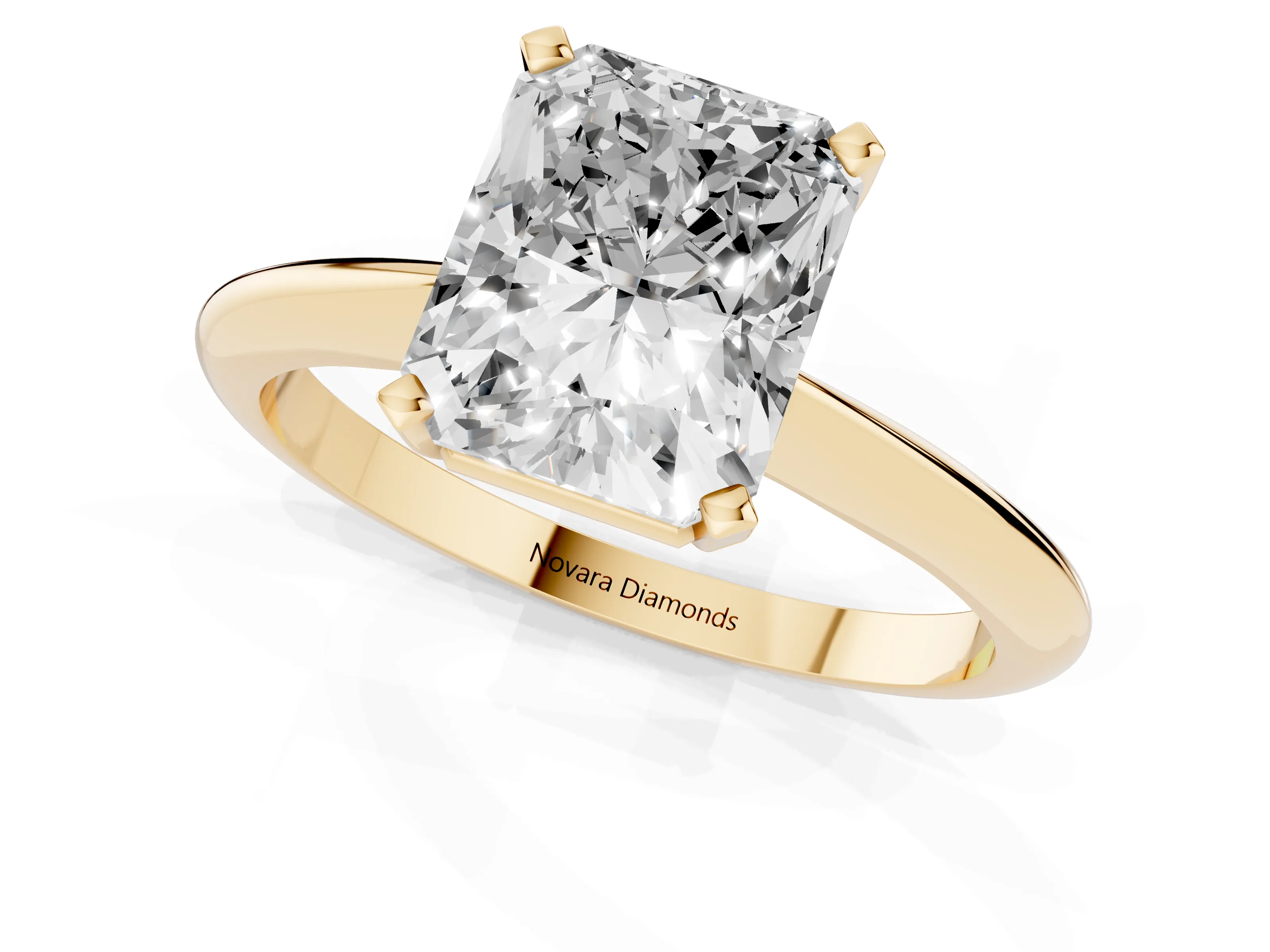 Radiant Cut Diamond Solitaire Ring Set in Yellow gold with Prong Setting on a Plain Round Band