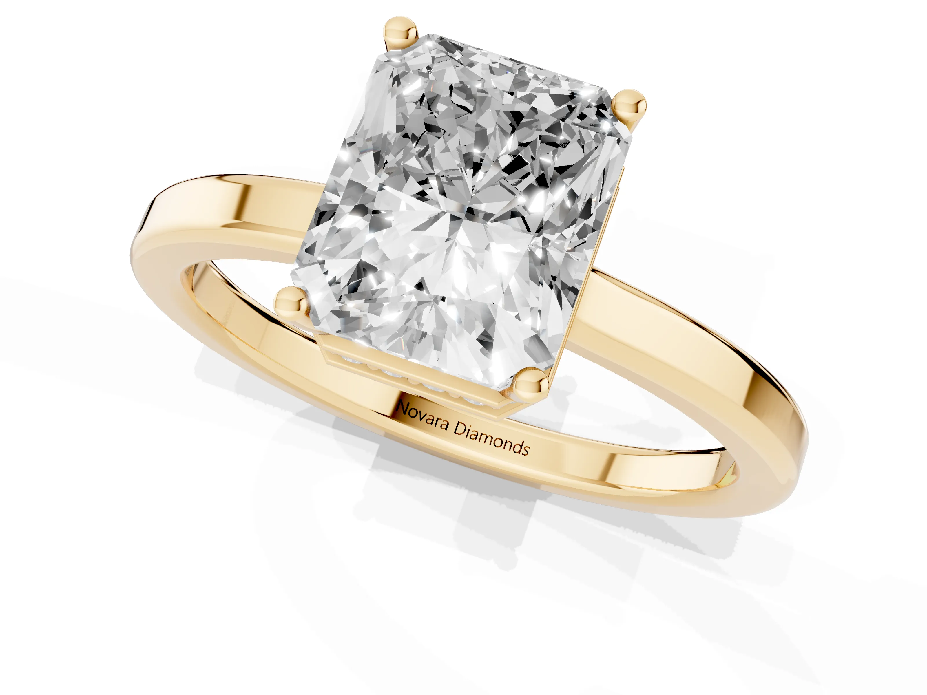 Radiant Cut Diamond Solitaire Engagement Ring Set in Yellow gold with Prong Setting on a Plain Band