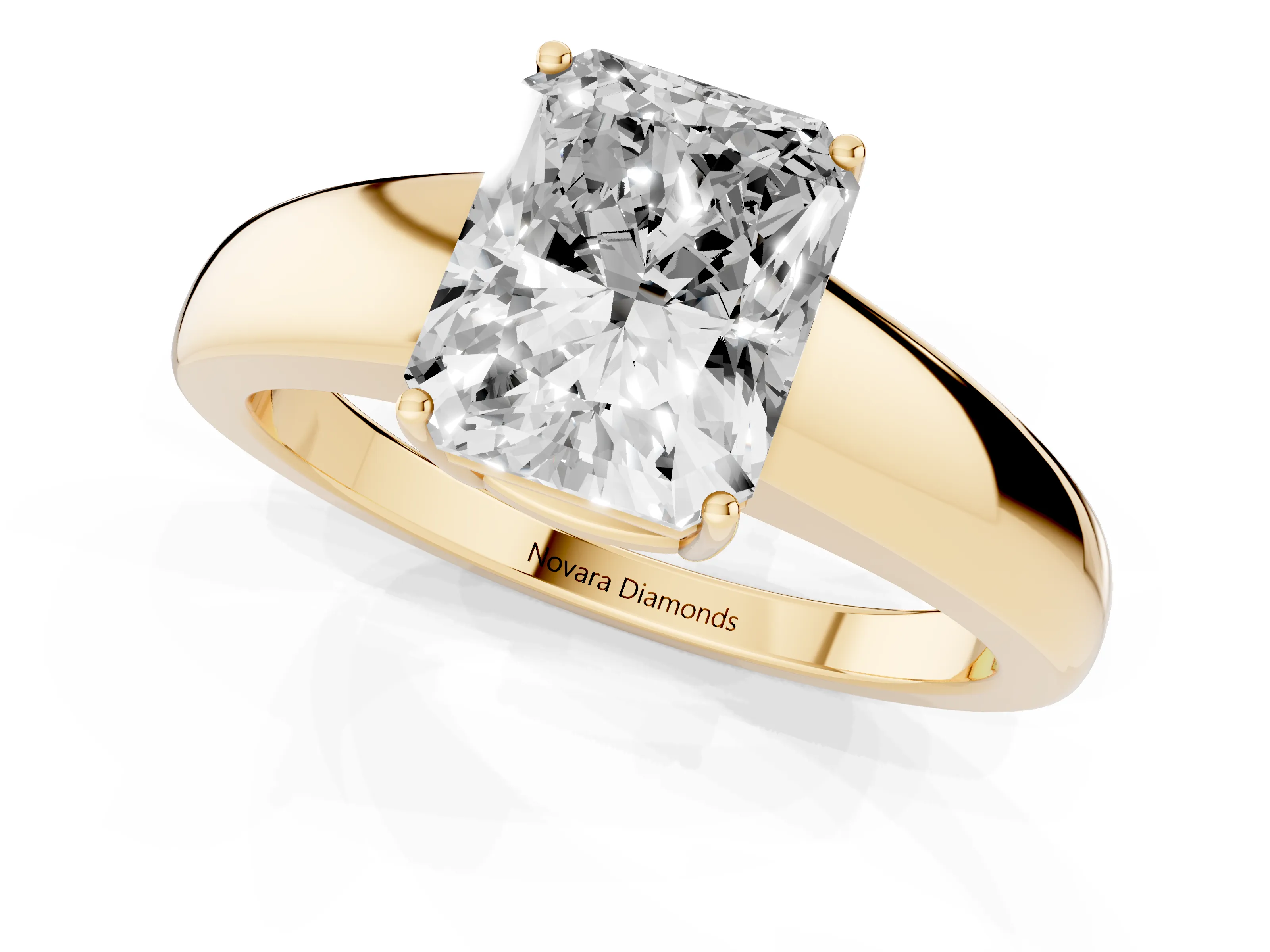 Radiant Cut Diamond Solitaire Ring Set in Yellow gold with Tapered Band and Prong Setting