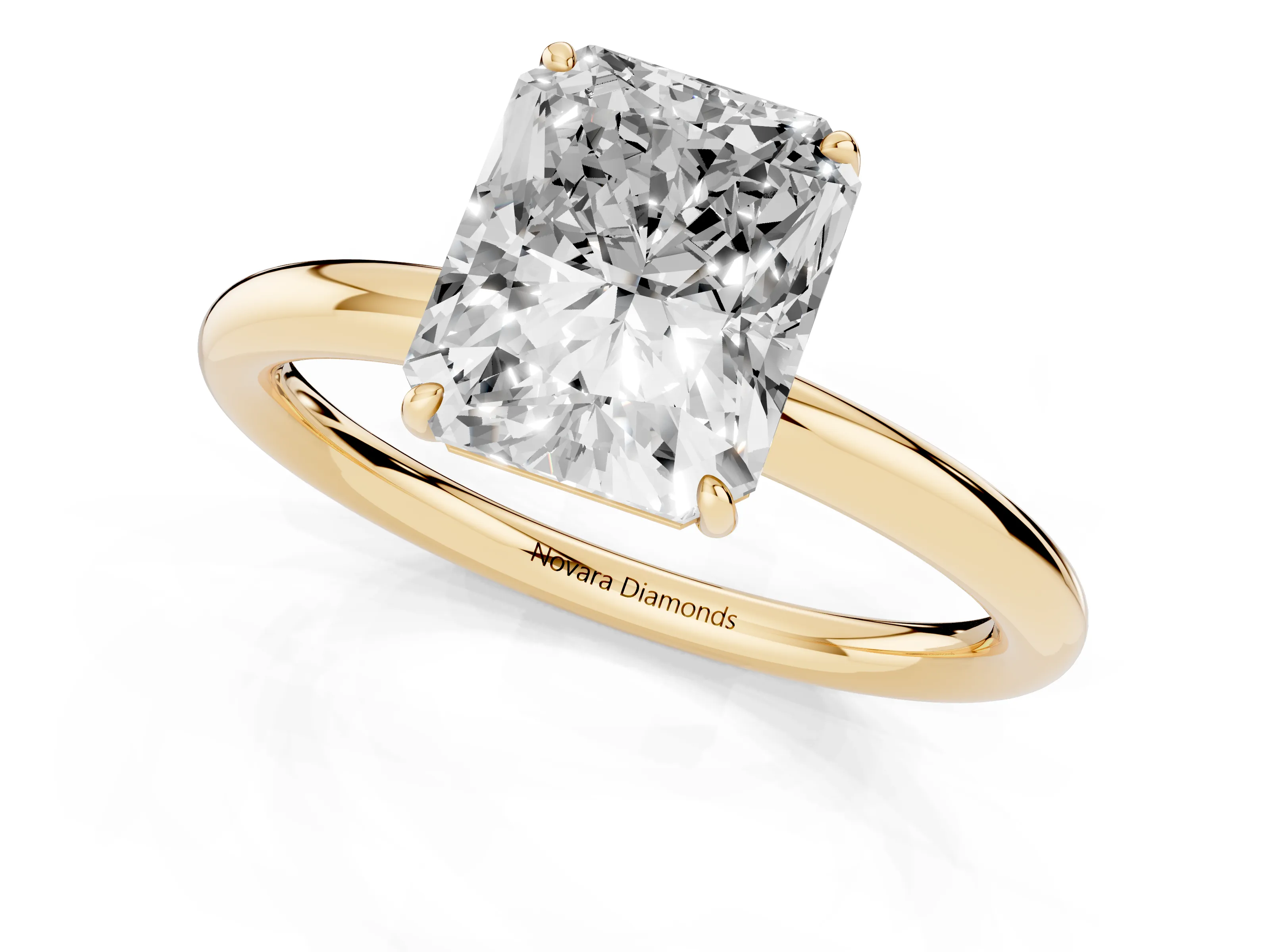 Radiant Cut Diamond Solitaire Ring Set in Yellow gold with Prong Setting on a Polished Plain Band