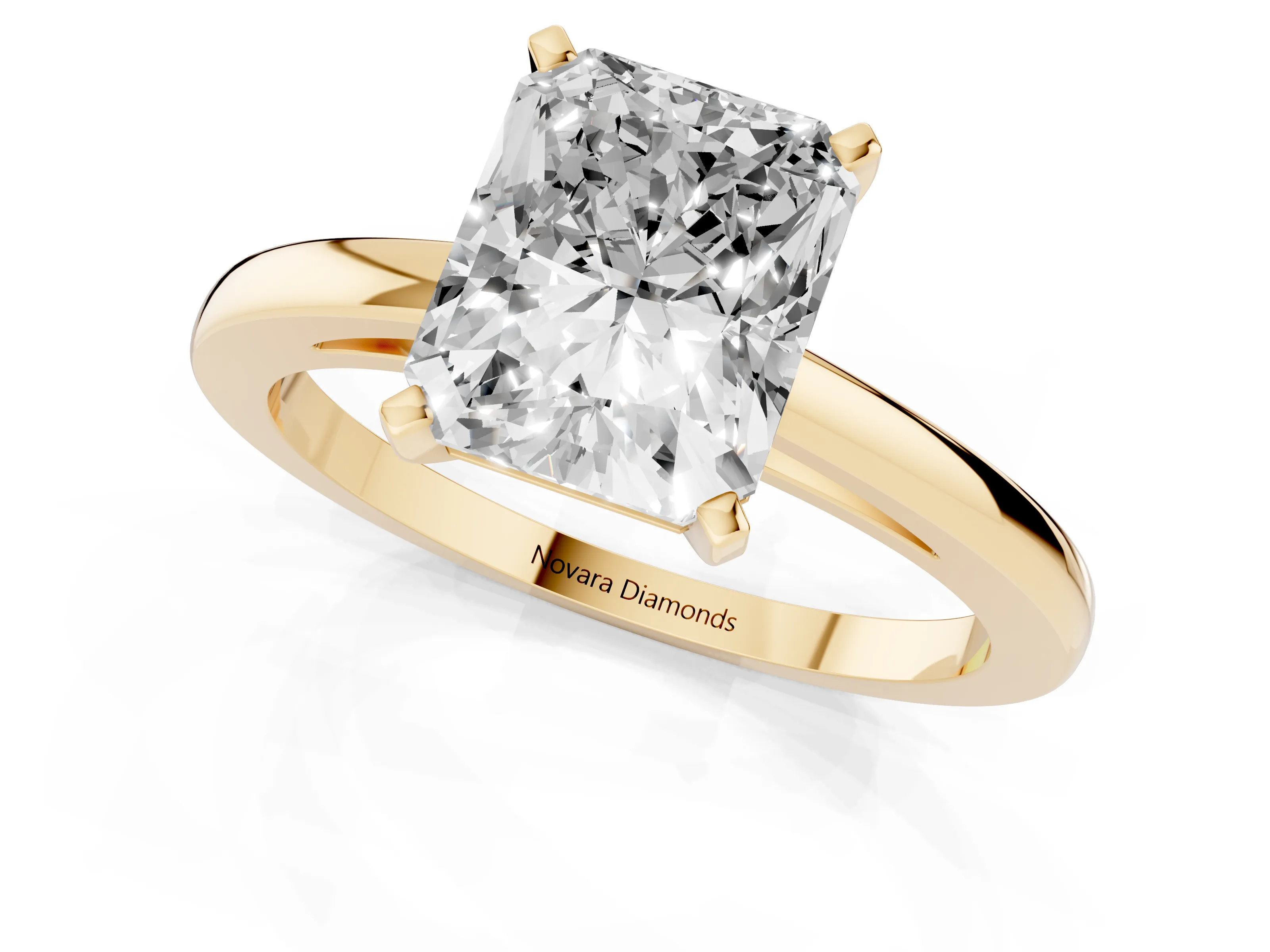 Radiant Cut Diamond Solitaire Engagement Ring Set in Yellow gold with Prong Setting on a Classic Band