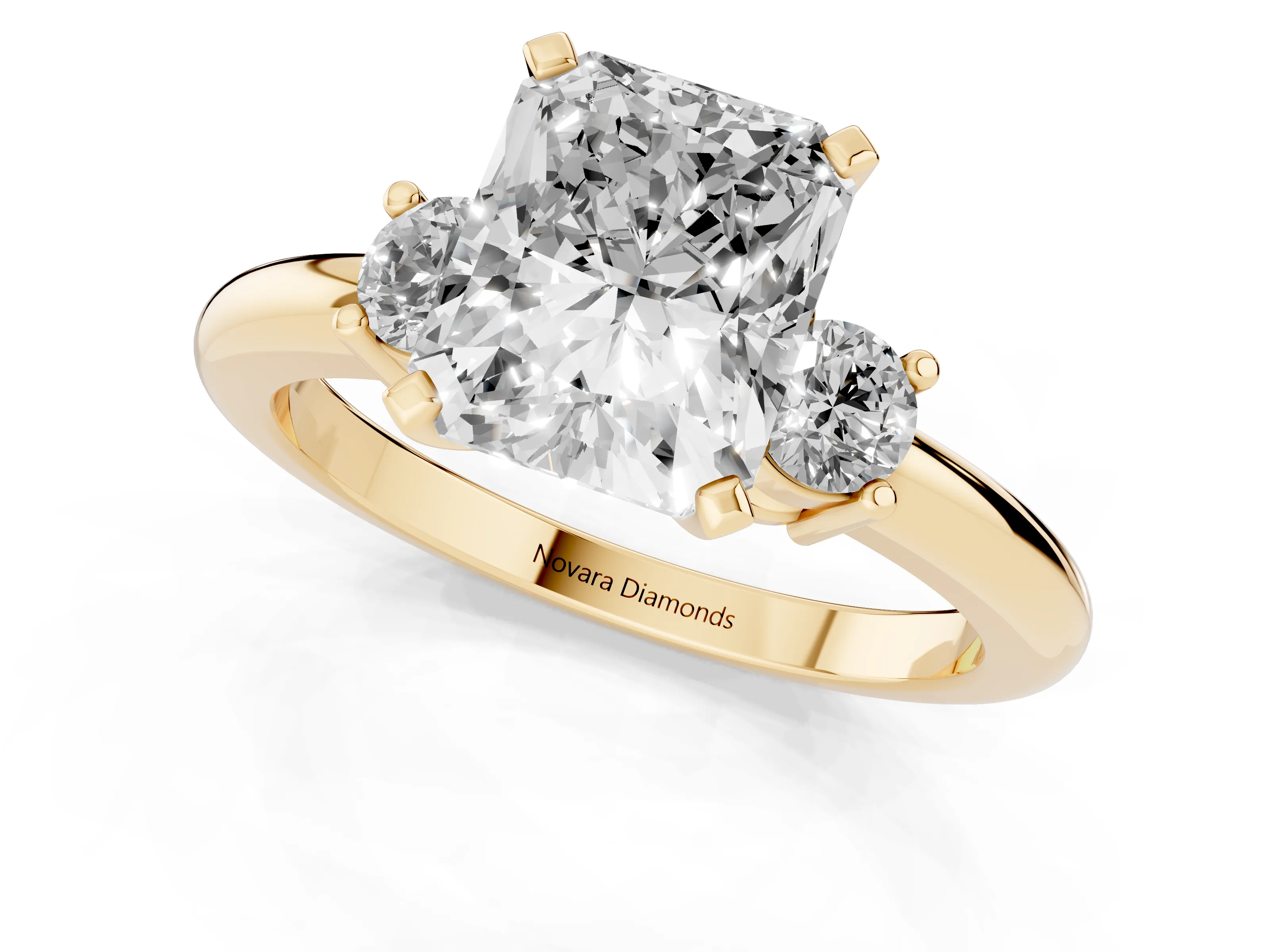 Three-Stone Radiant Cut Diamond Ring Set in Yellow gold with Prong Setting and Plain Band