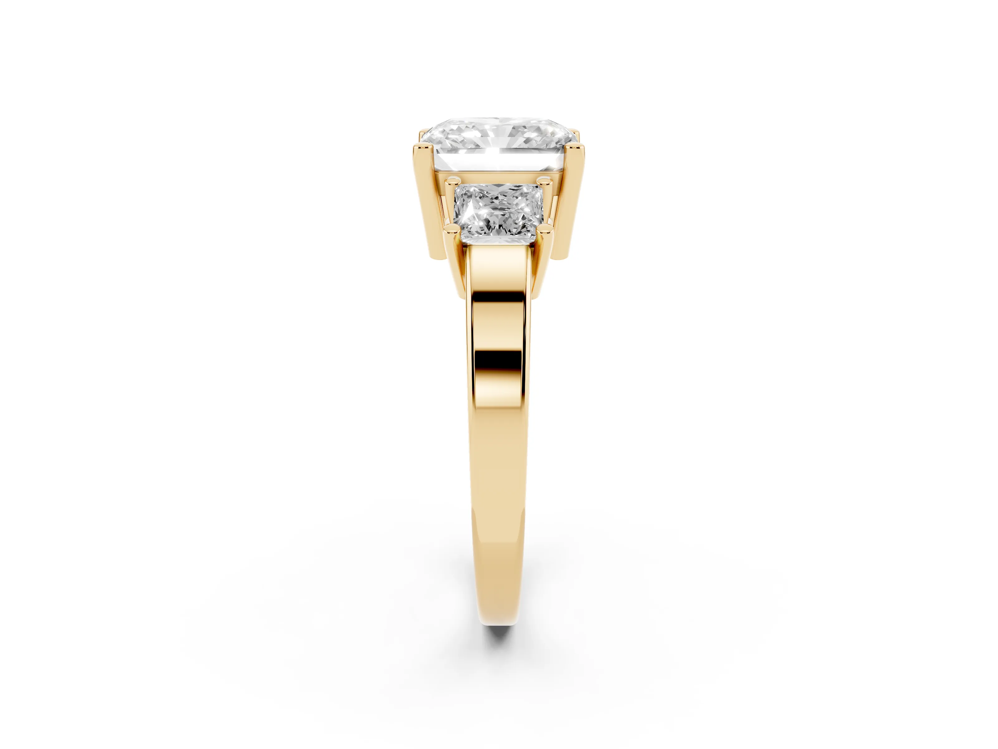 Three-Stone Radiant Cut Diamond Solitaire Ring Set in Yellow gold with Prong Setting