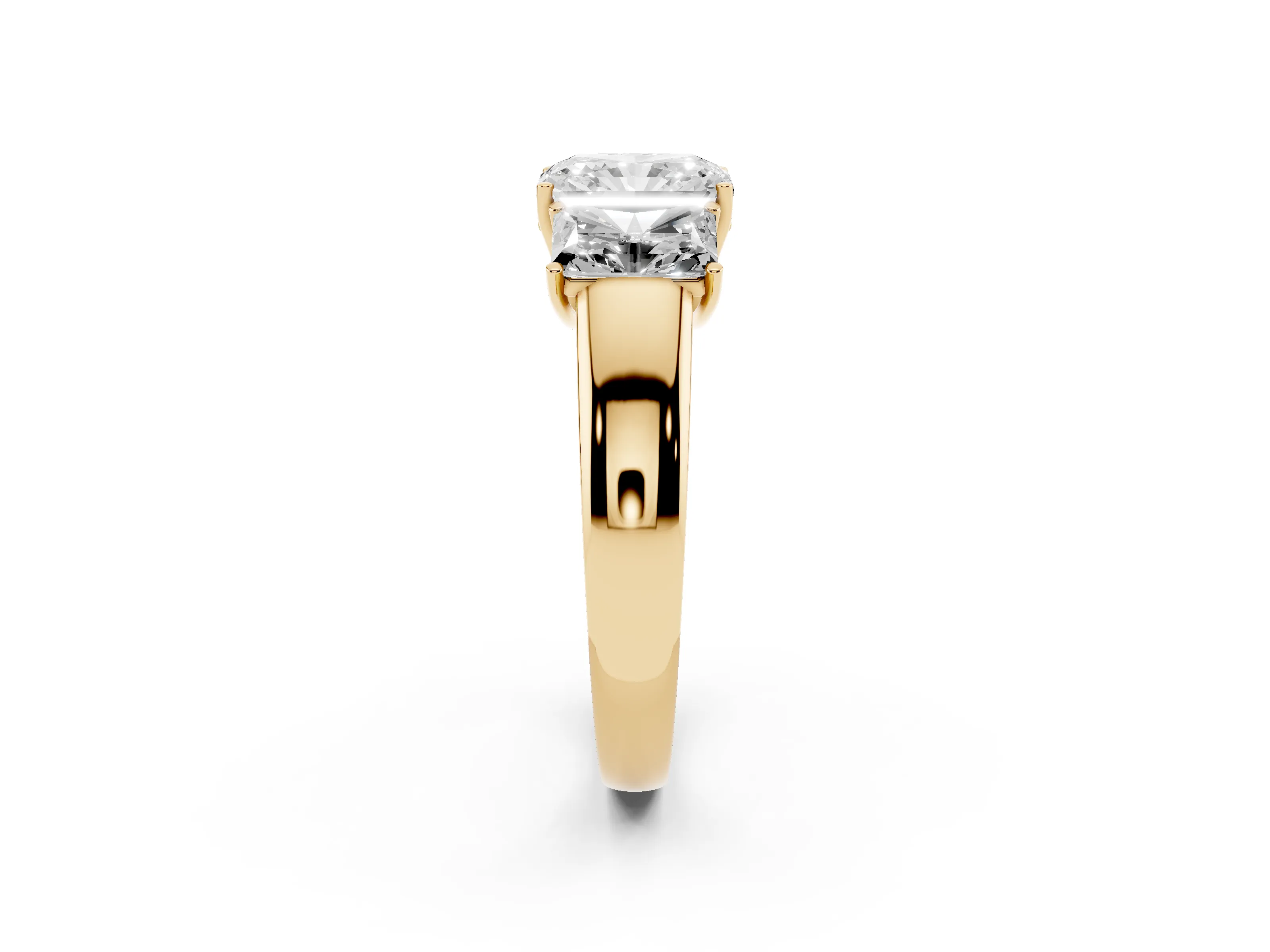 Three-Stone Radiant Cut Diamond Ring Set in Yellow gold with Matching Prong Settings and Plain Band