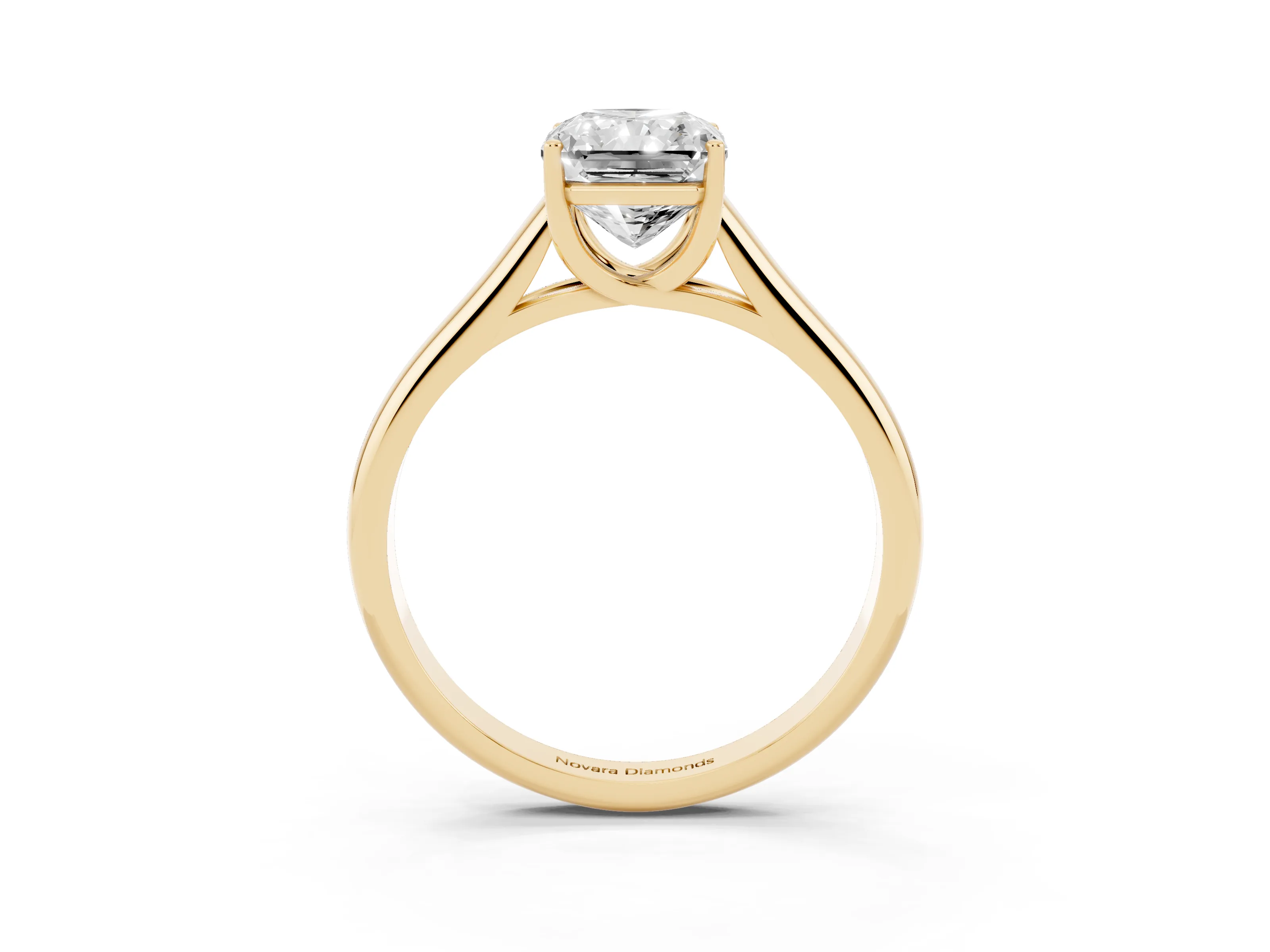 Radiant Cut Diamond Solitaire Engagement Ring Set in Yellow gold with Subtly Tapered Band and Prong Setting