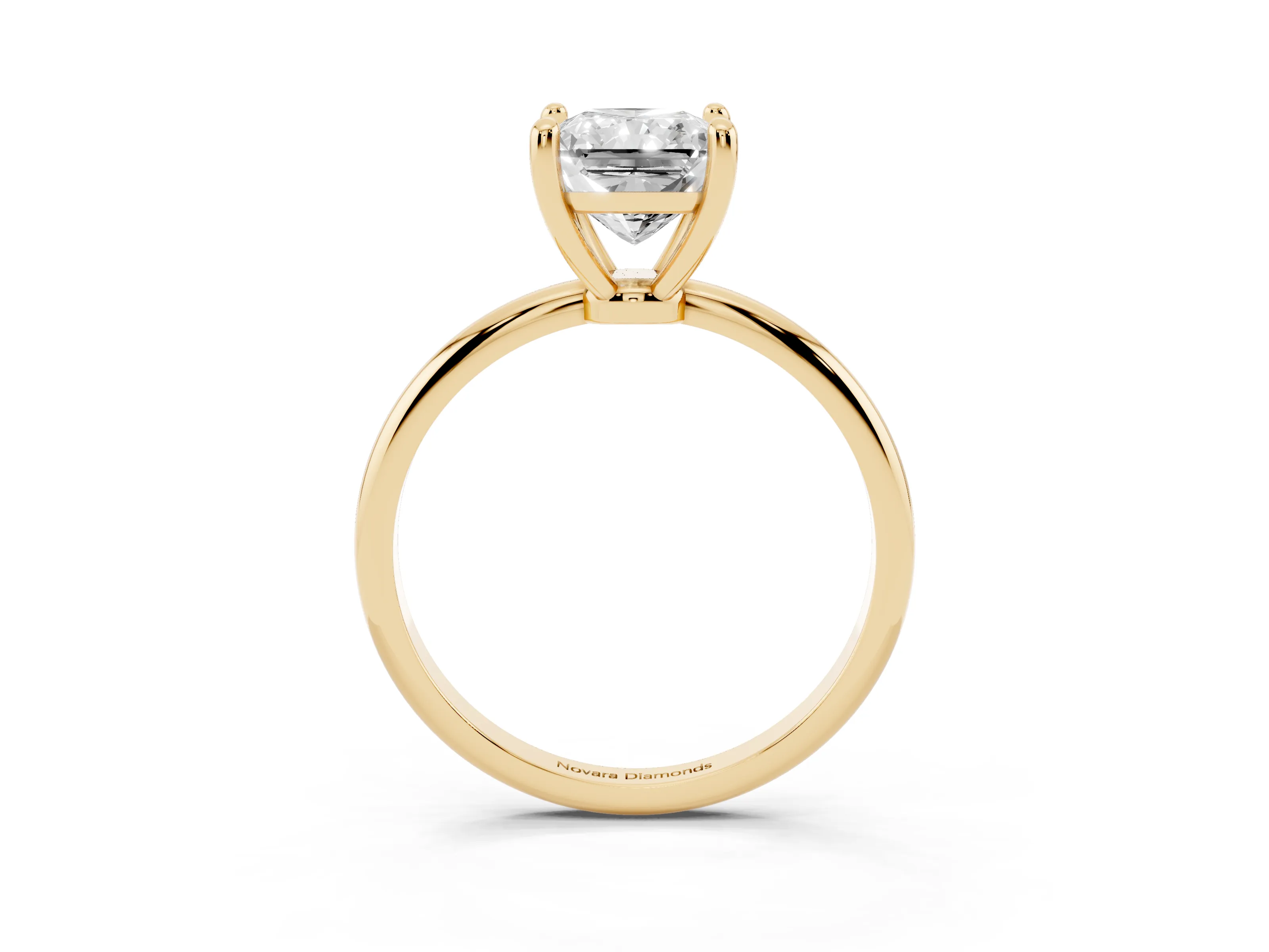 Radiant Cut Diamond Solitaire Ring Set in Yellow gold with Secure Prong Setting on a Classic Band