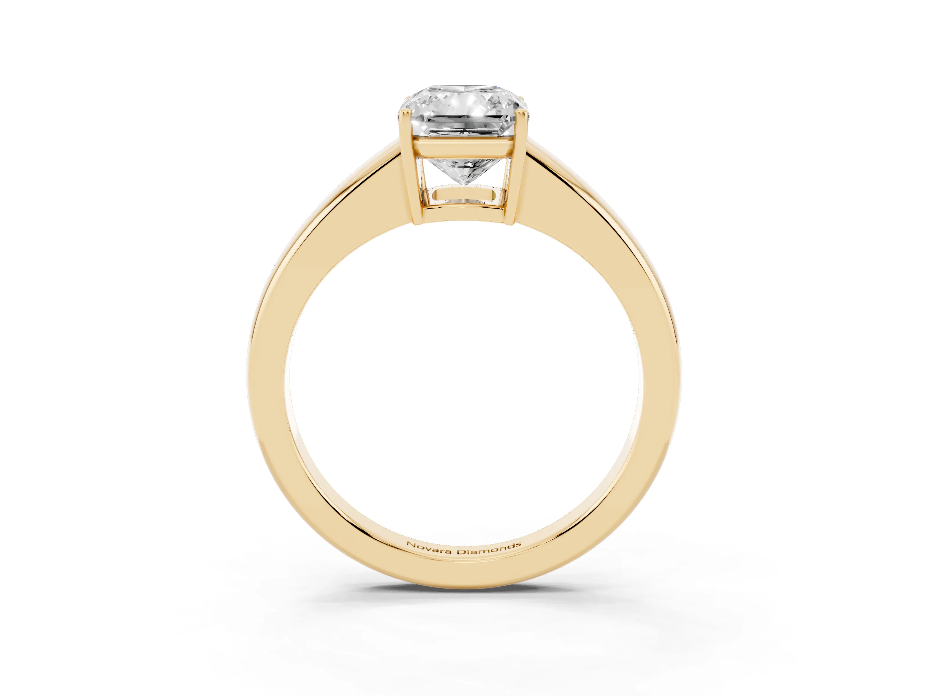 Radiant Cut Diamond Solitaire Ring Set in Yellow gold with Tapered Band and Prong Setting