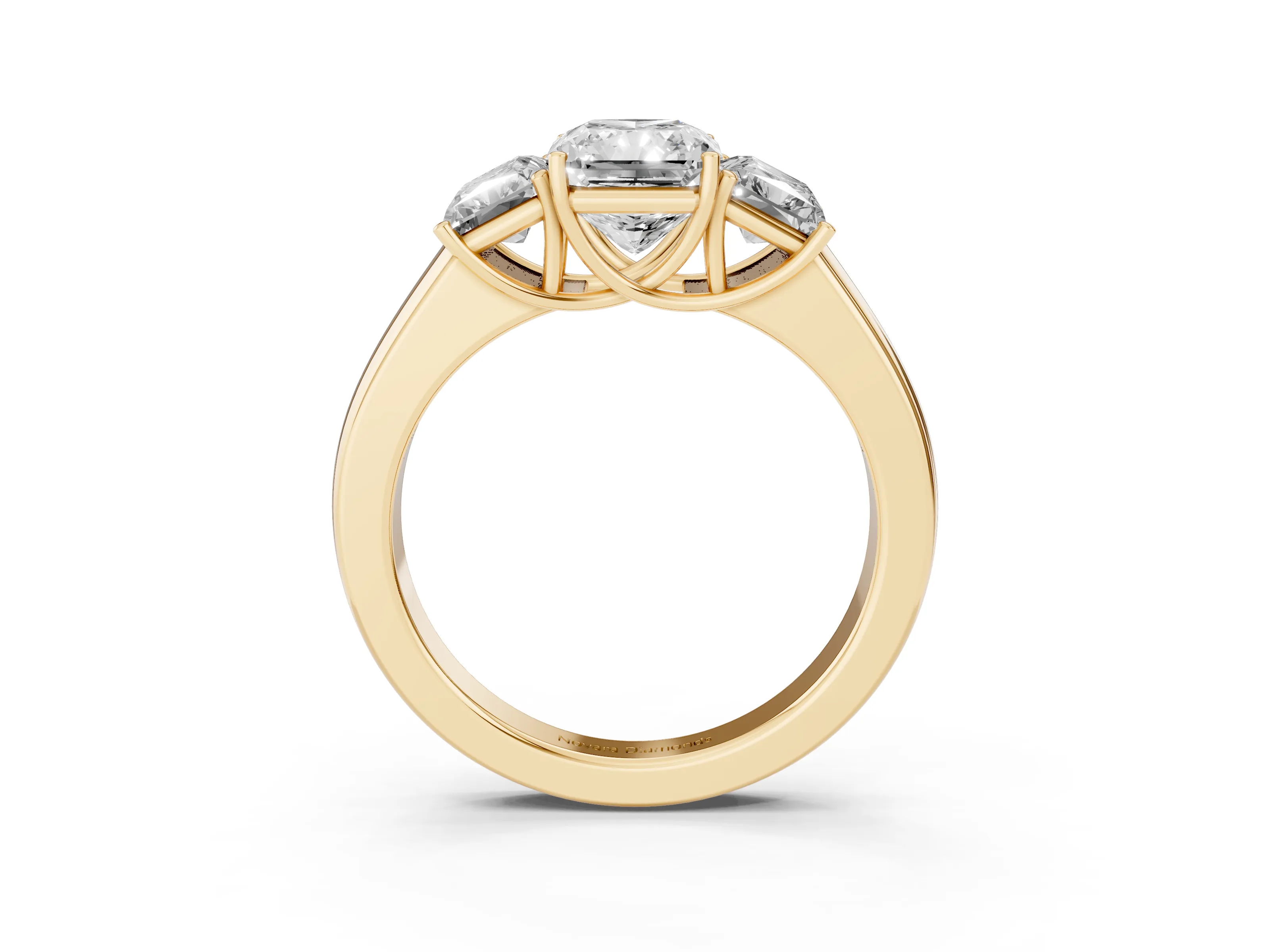 Three-Stone Radiant Cut Diamond Ring Set in Yellow gold with Matching Prong Settings and Plain Band