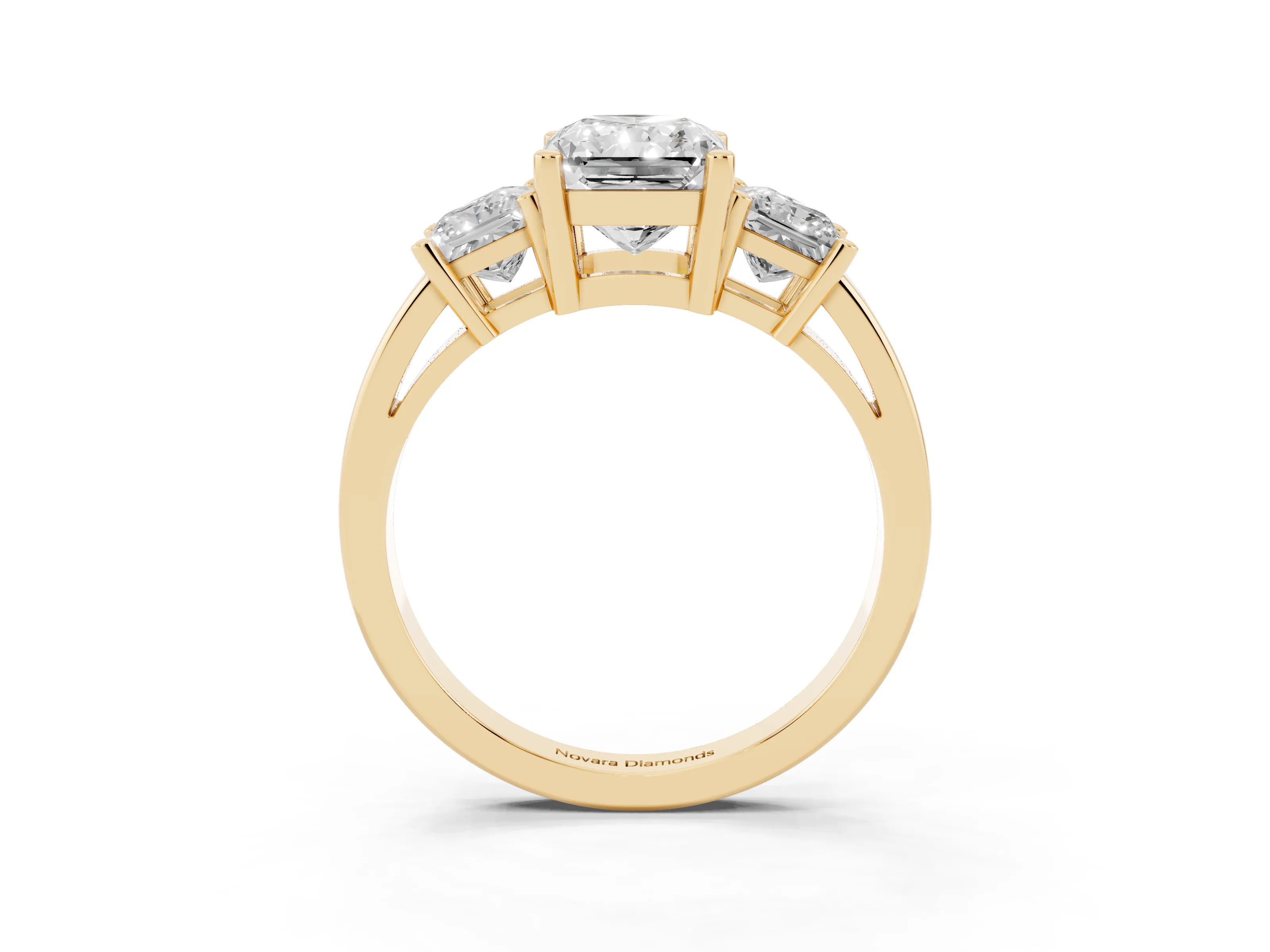 Three-Stone Radiant Cut Diamond Solitaire Ring Set in Yellow gold with Prong Setting