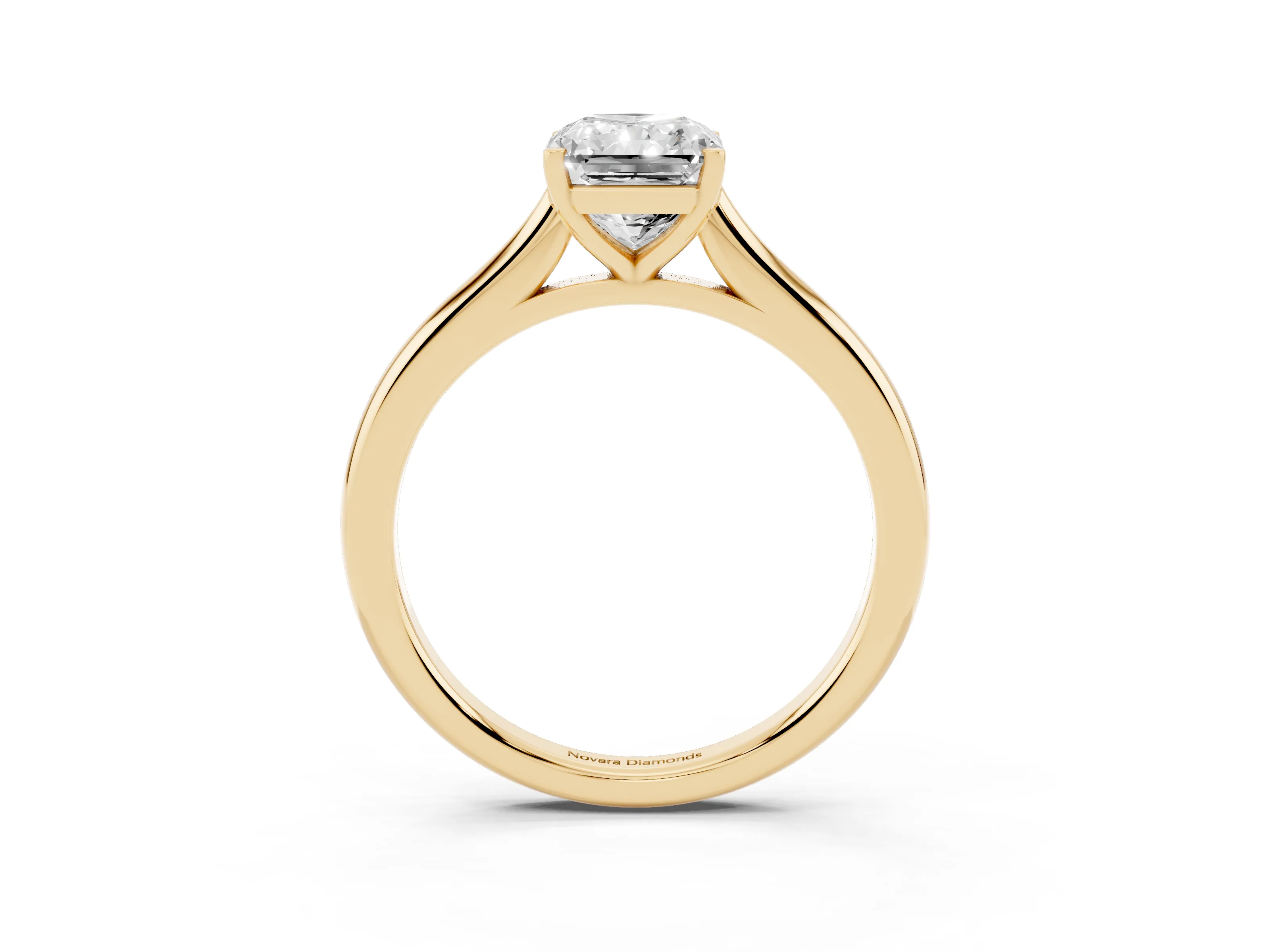 Radiant Cut Diamond Solitaire Ring Set in Yellow gold with Cathedral Band and Prong Setting