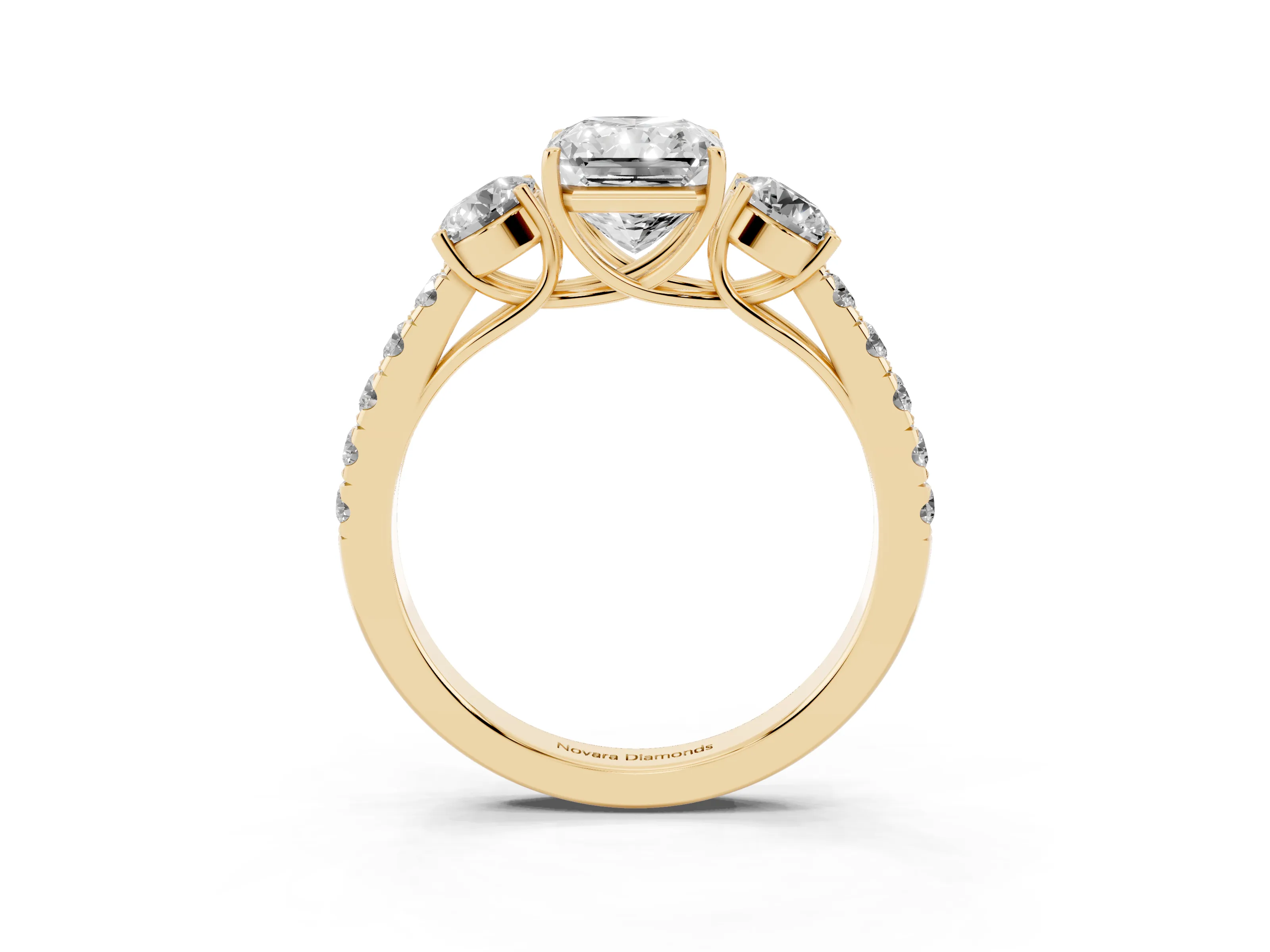 Radiant Cut Diamond Three-Stone Ring Set in Yellow gold with Round Side Stones and Delicate Pavé Band