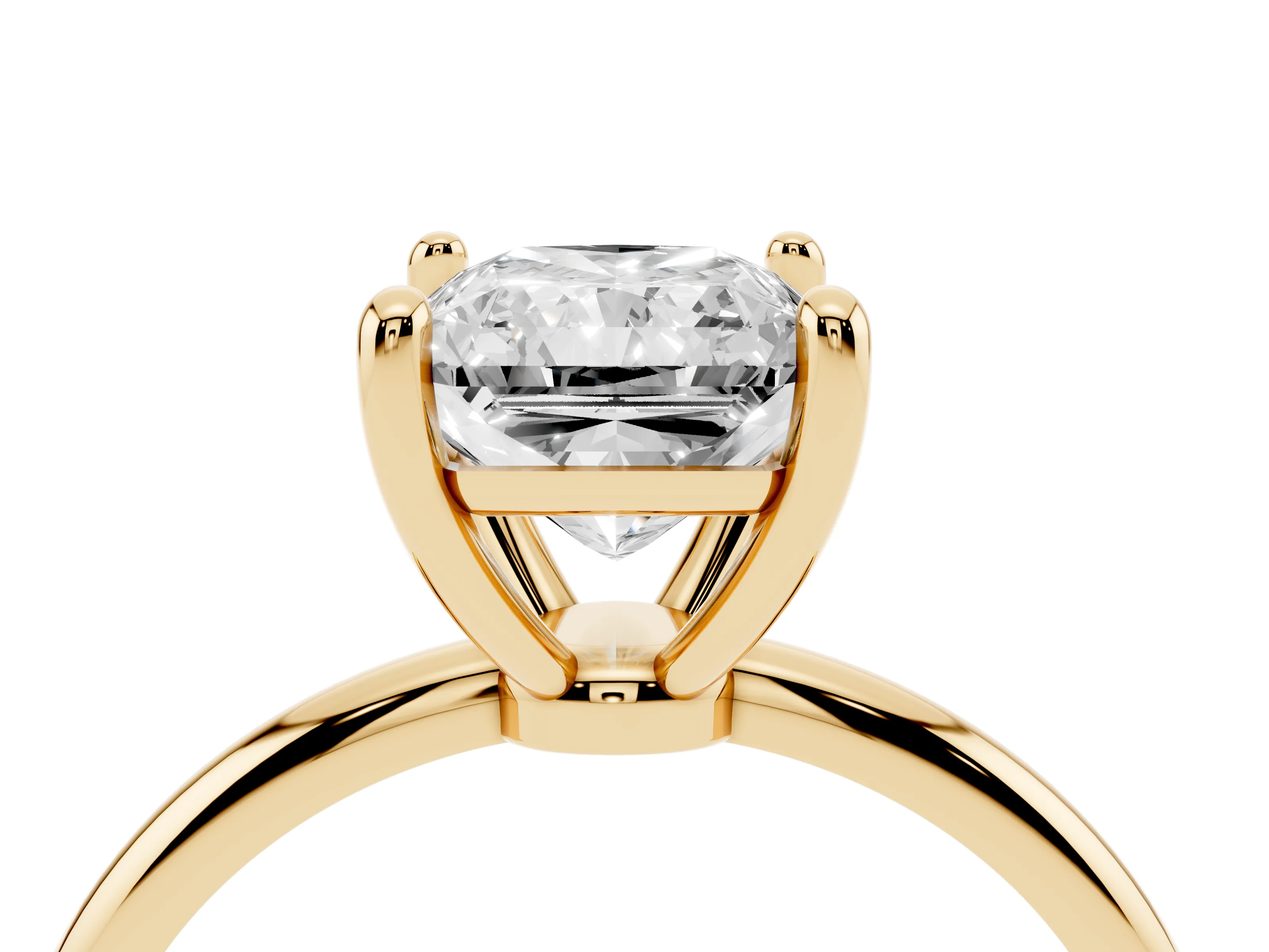 Radiant Cut Diamond Solitaire Ring Set in Yellow gold with Secure Prong Setting on a Classic Band