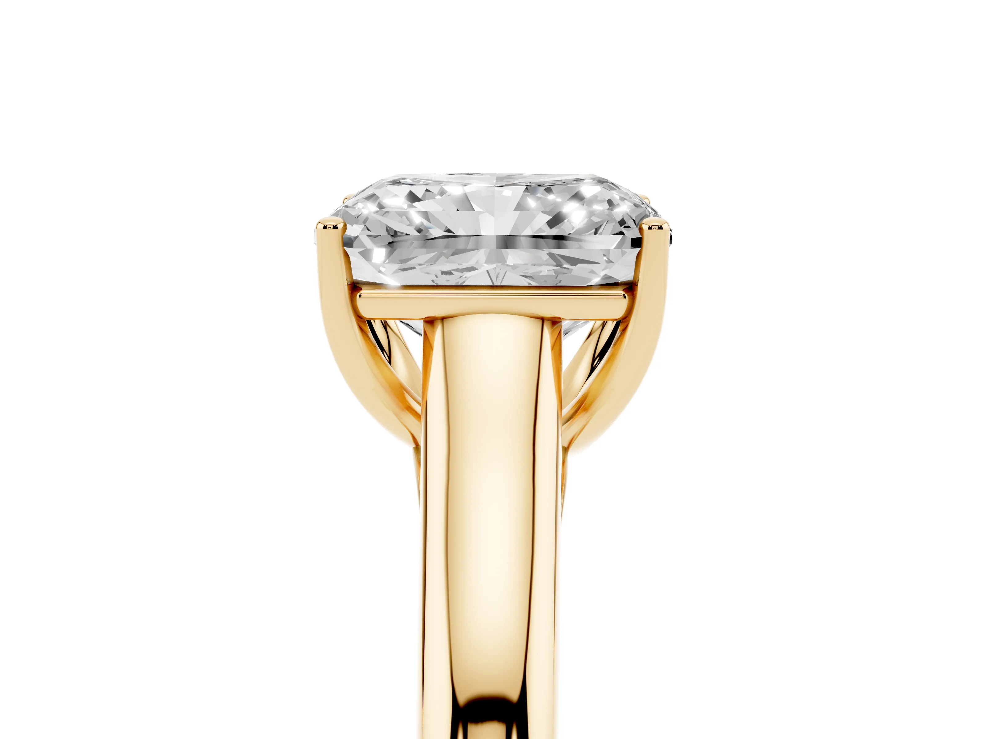 Radiant Cut Diamond Solitaire Engagement Ring Set in Yellow gold with Subtly Tapered Band and Prong Setting