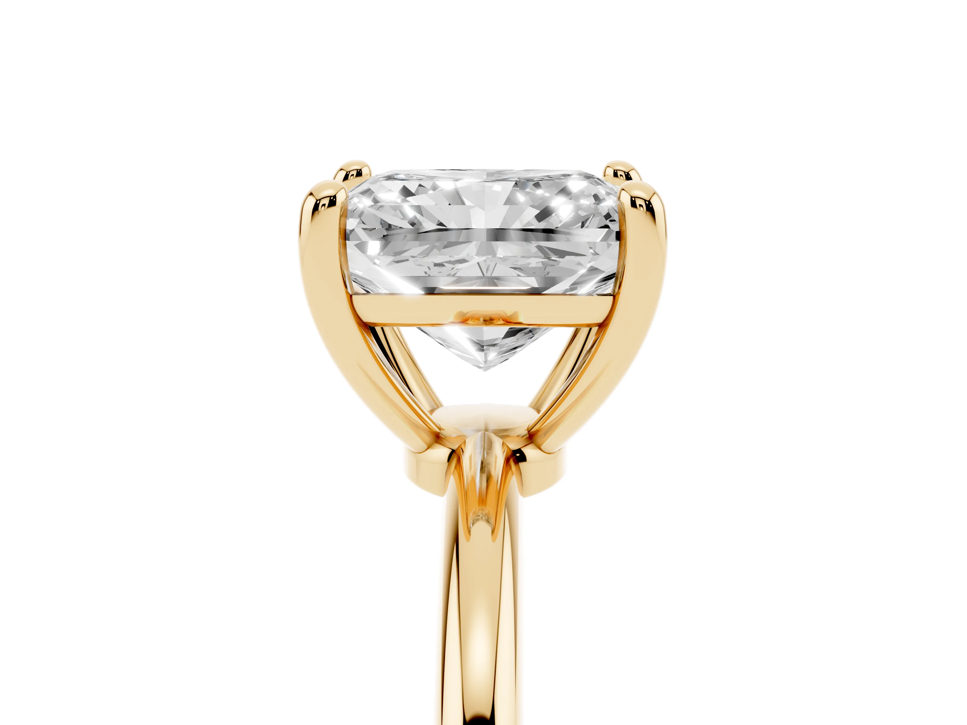 Radiant Cut Diamond Solitaire Ring Set in Yellow gold with Secure Prong Setting on a Classic Band