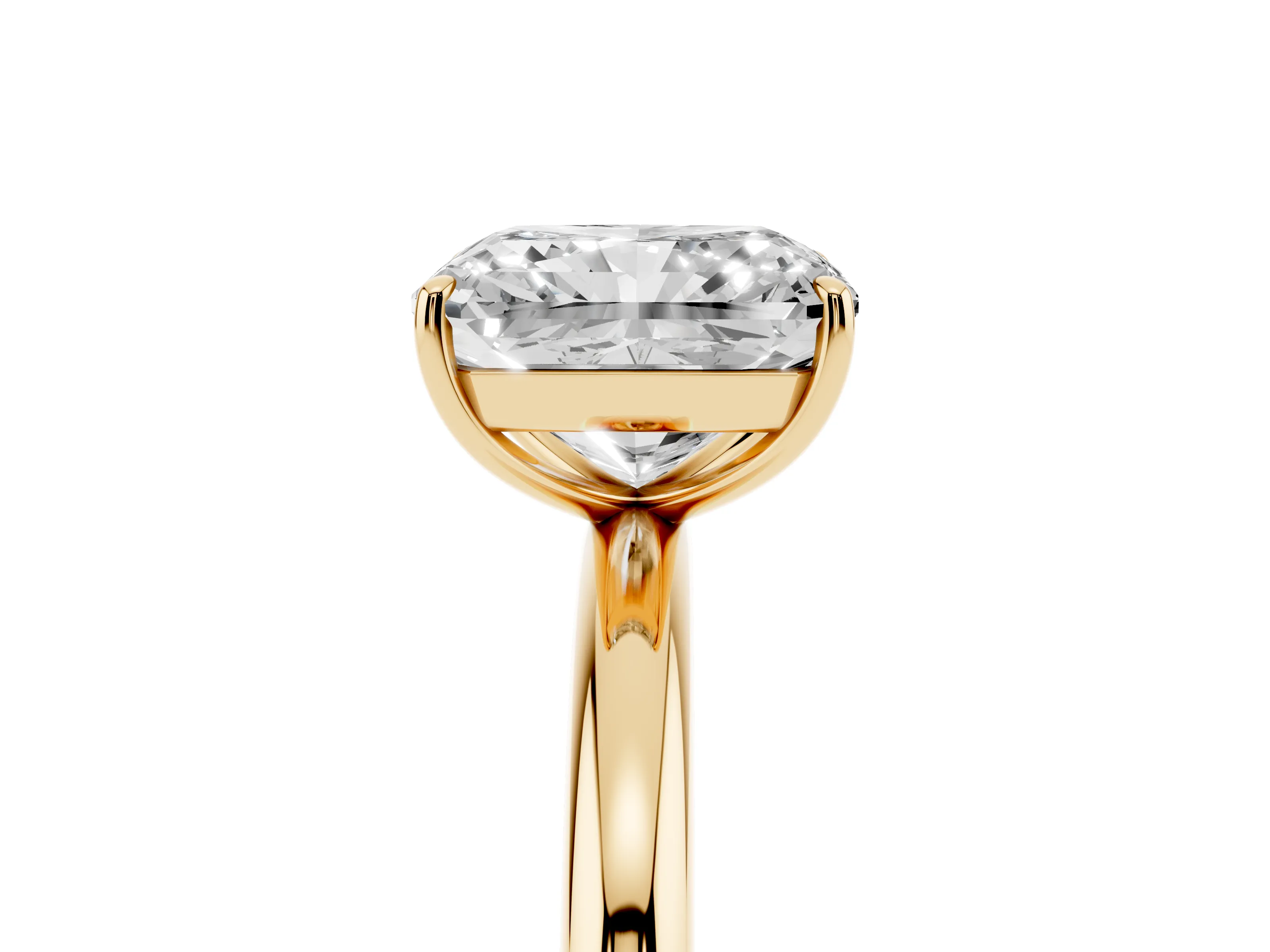 Radiant Cut Diamond Solitaire Ring Set in Yellow gold with Prong Setting on a Polished Plain Band