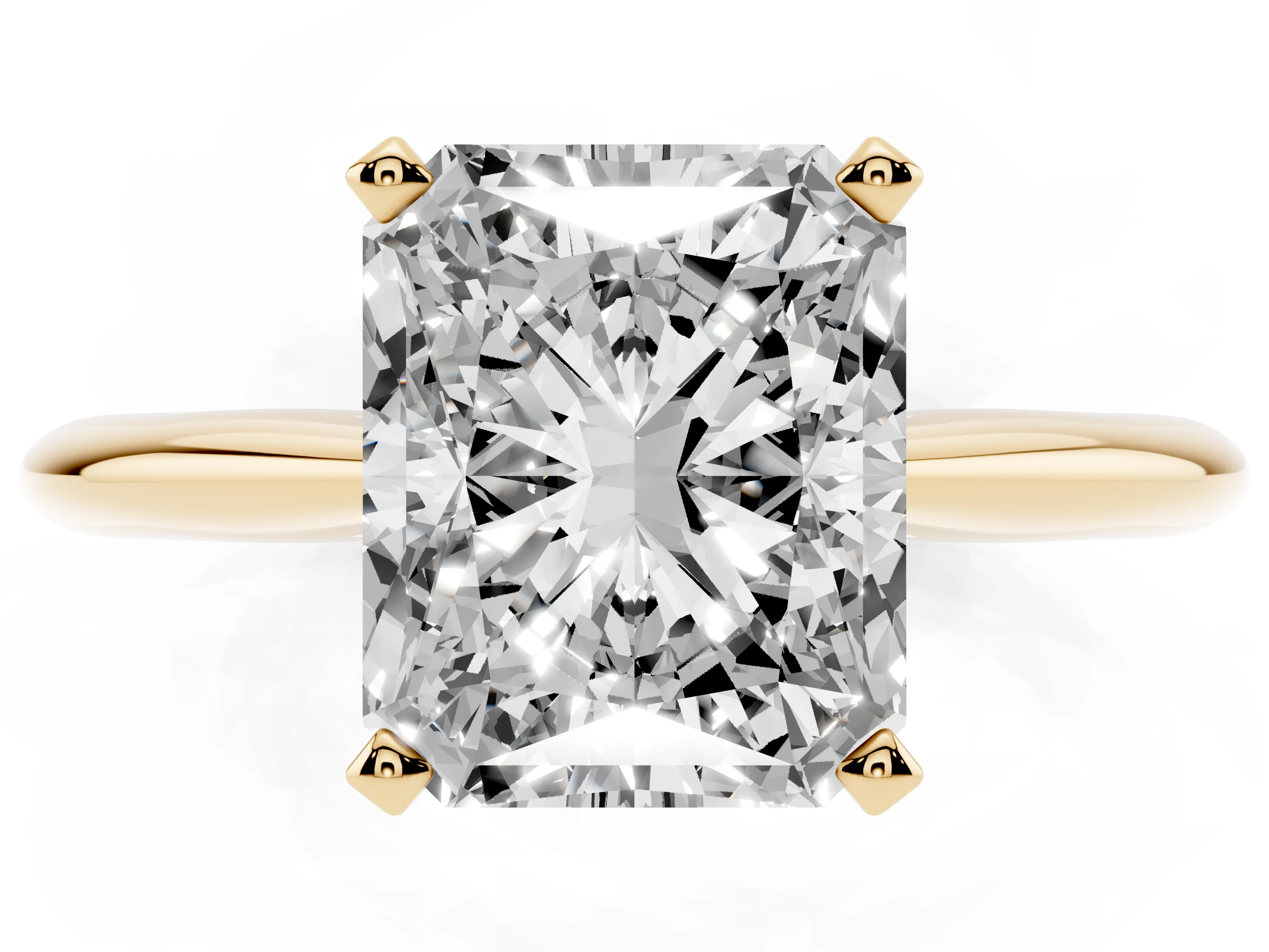 Radiant Cut Diamond Solitaire Ring Set in Yellow gold with Prong Setting on a Plain Round Band