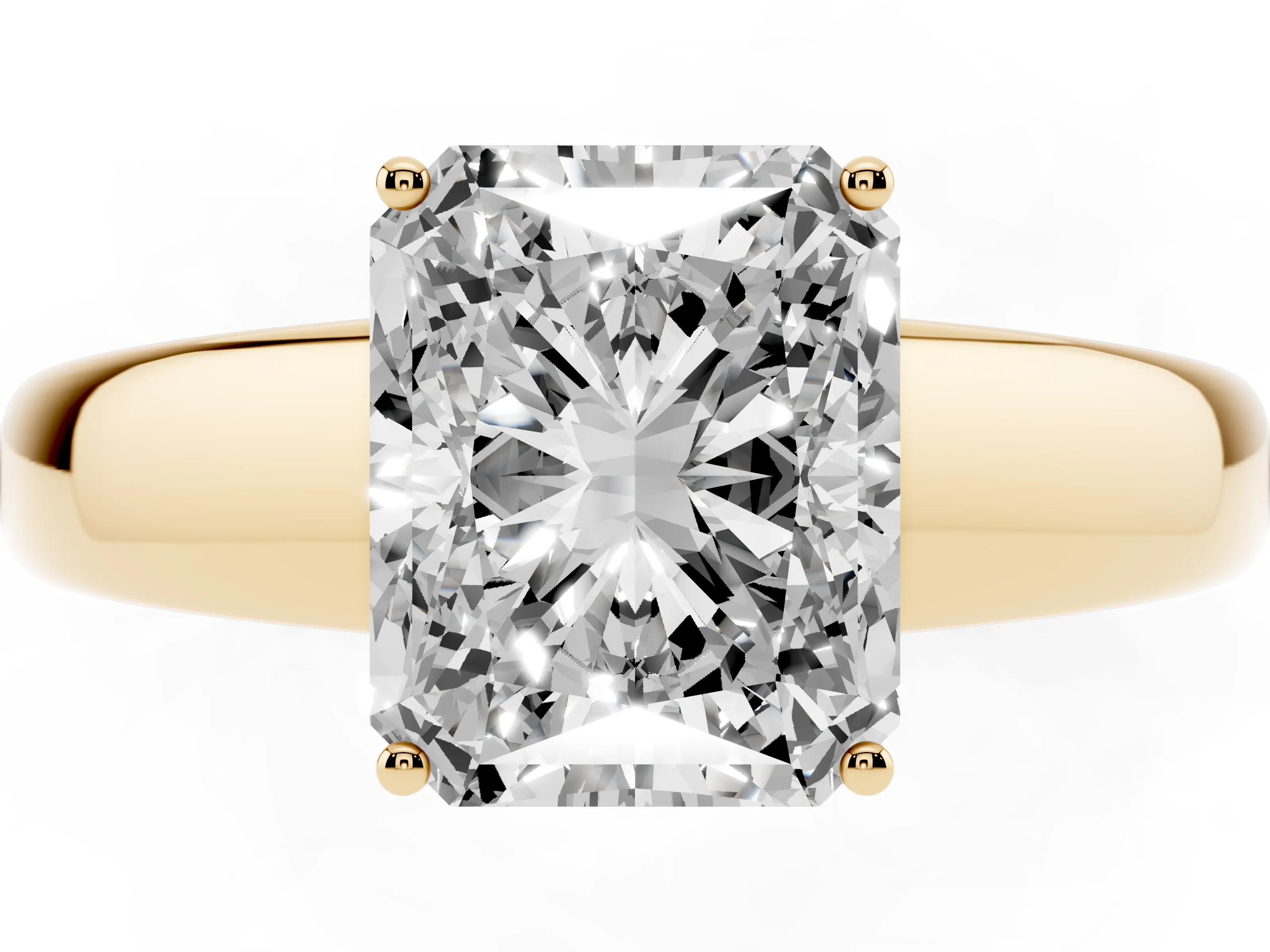 Radiant Cut Diamond Solitaire Ring Set in Yellow gold with Tapered Band and Prong Setting