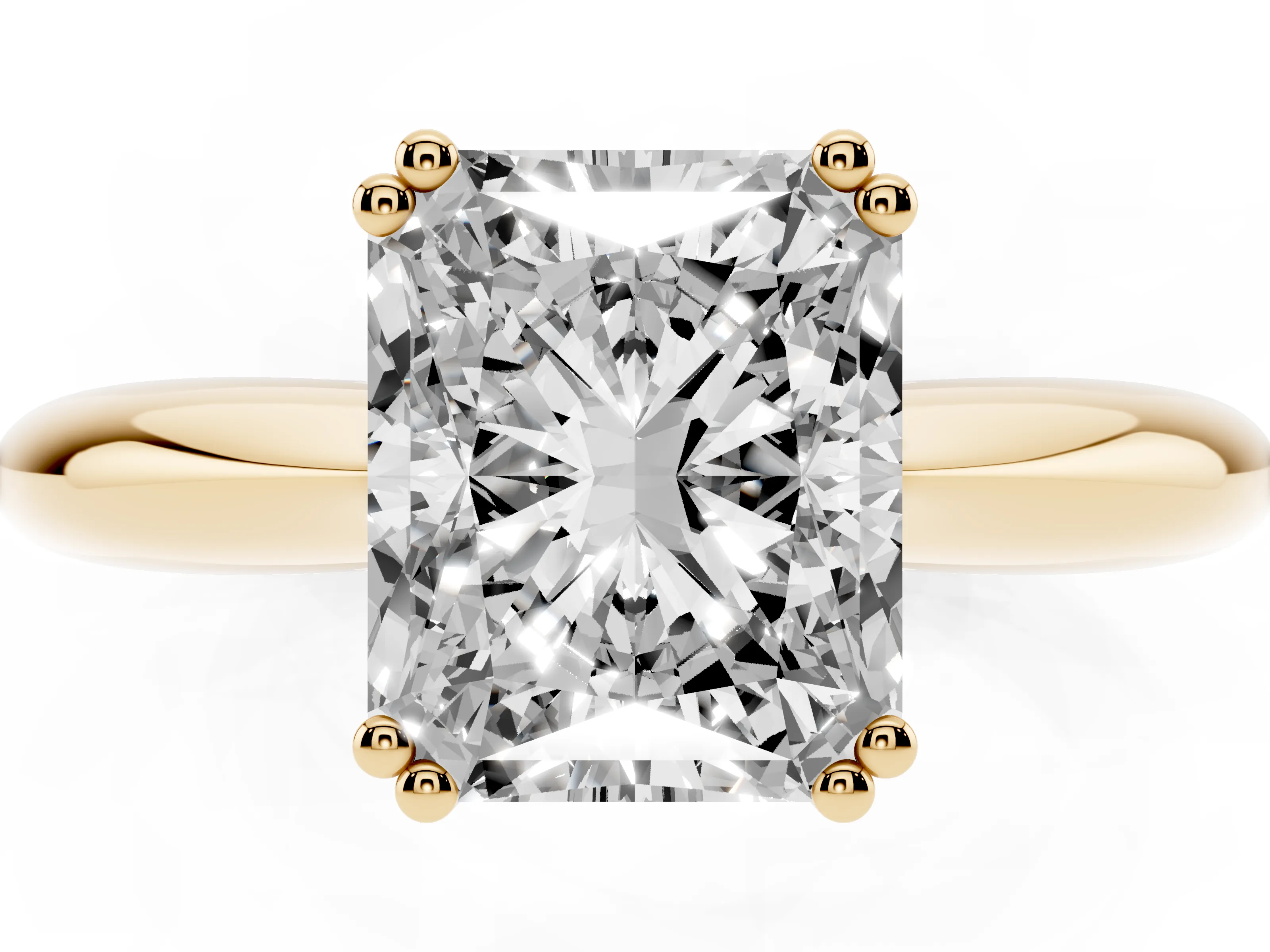 Radiant Cut Diamond Solitaire Engagement Ring Set in Yellow gold with Tapered Band and Prong Setting