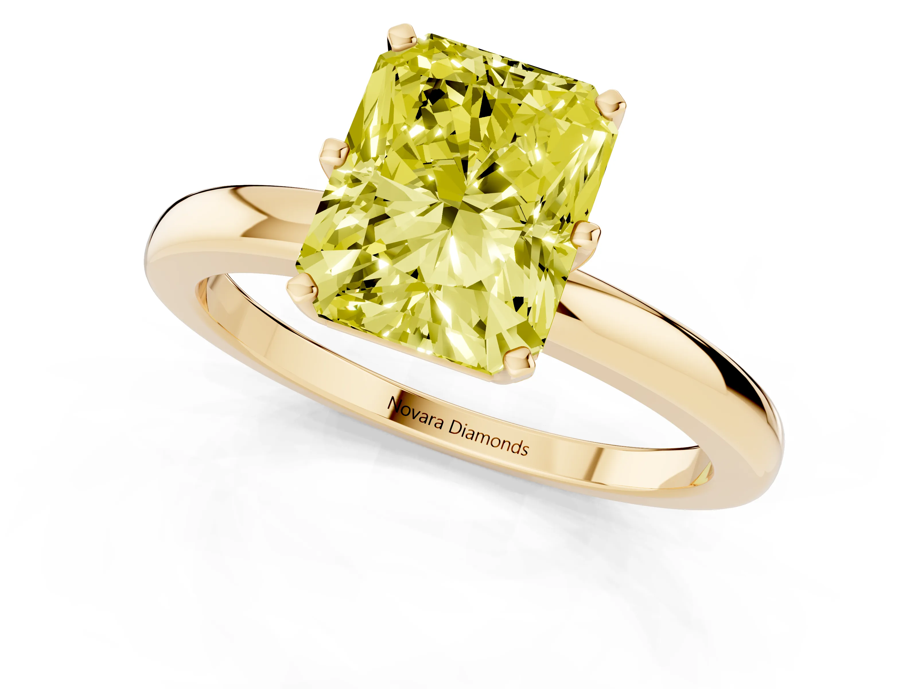 Fancy Yellow Radiant Cut Diamond Solitaire Ring Set in Yellow gold with Raised Prong Setting on a Classic Band