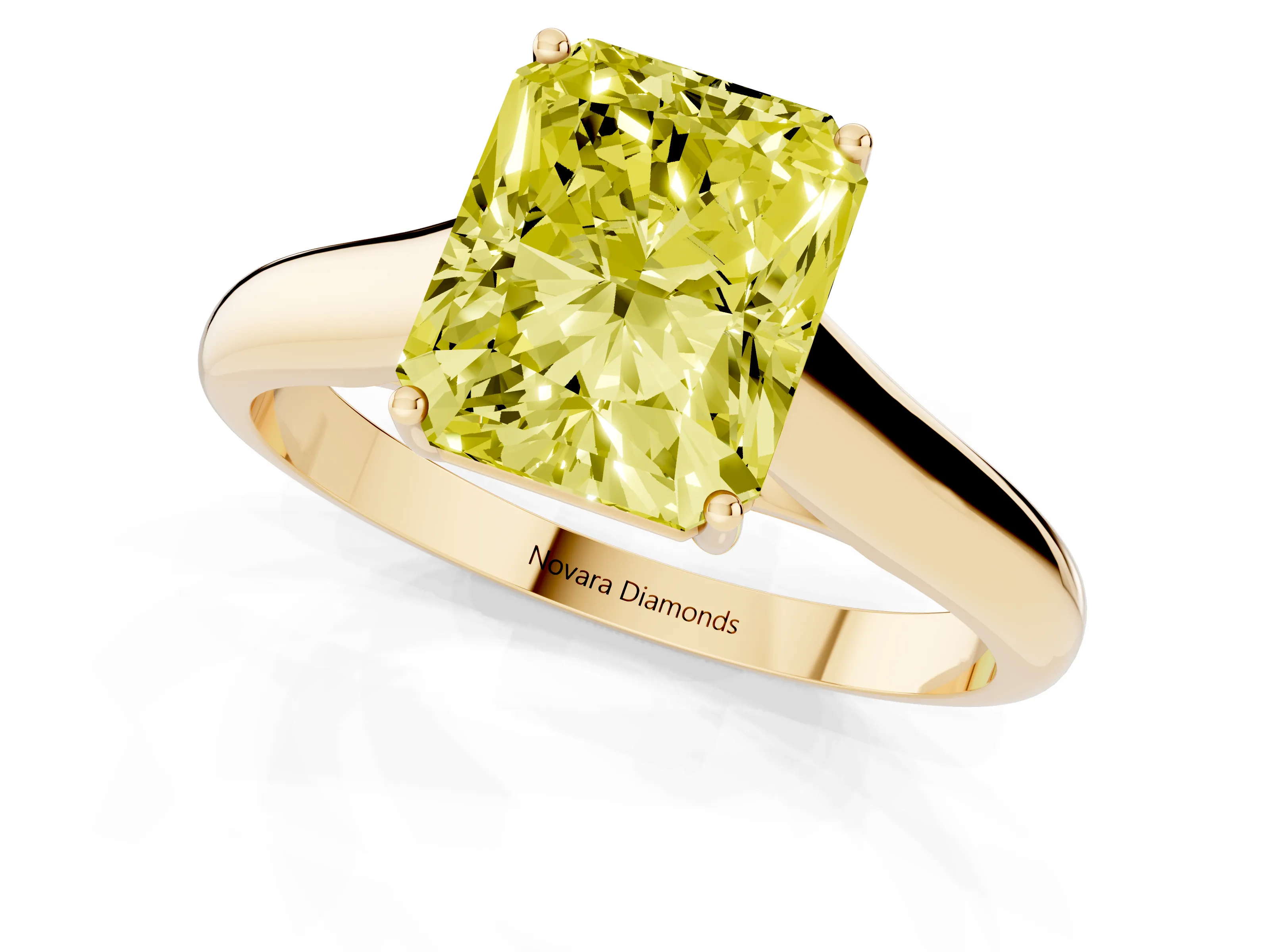 Fancy Yellow Radiant Cut Diamond Solitaire Engagement Ring Set in Yellow gold with Subtly Tapered Band and Prong Setting