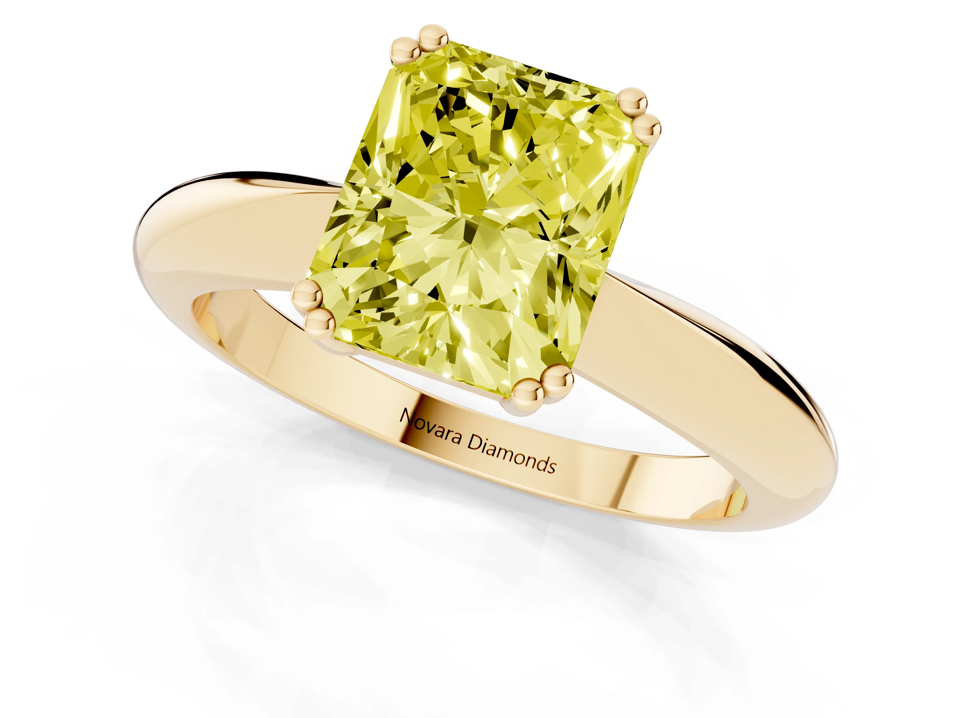 Fancy Yellow Radiant Cut Diamond Solitaire Engagement Ring Set in Yellow gold with Tapered Band and Prong Setting