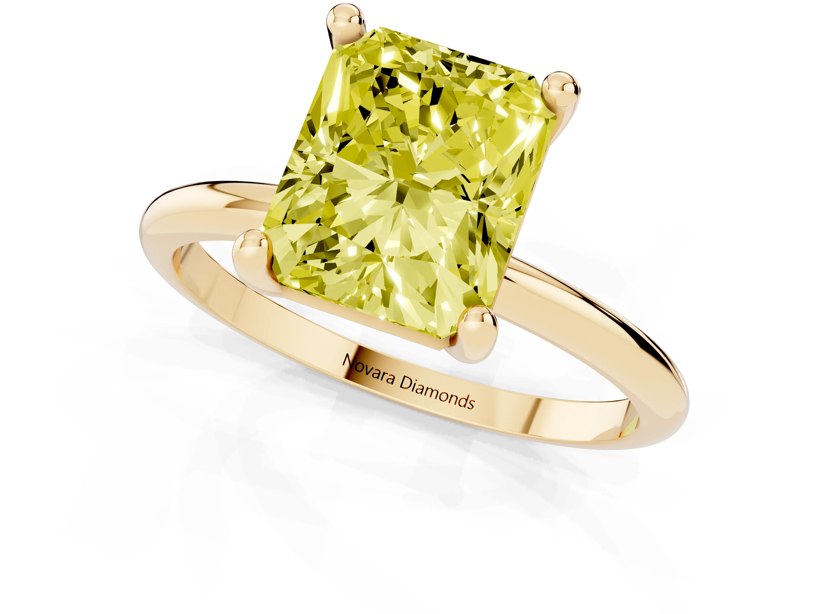 Fancy Yellow Radiant Cut Diamond Solitaire Ring Set in Yellow gold with Secure Prong Setting on a Classic Band