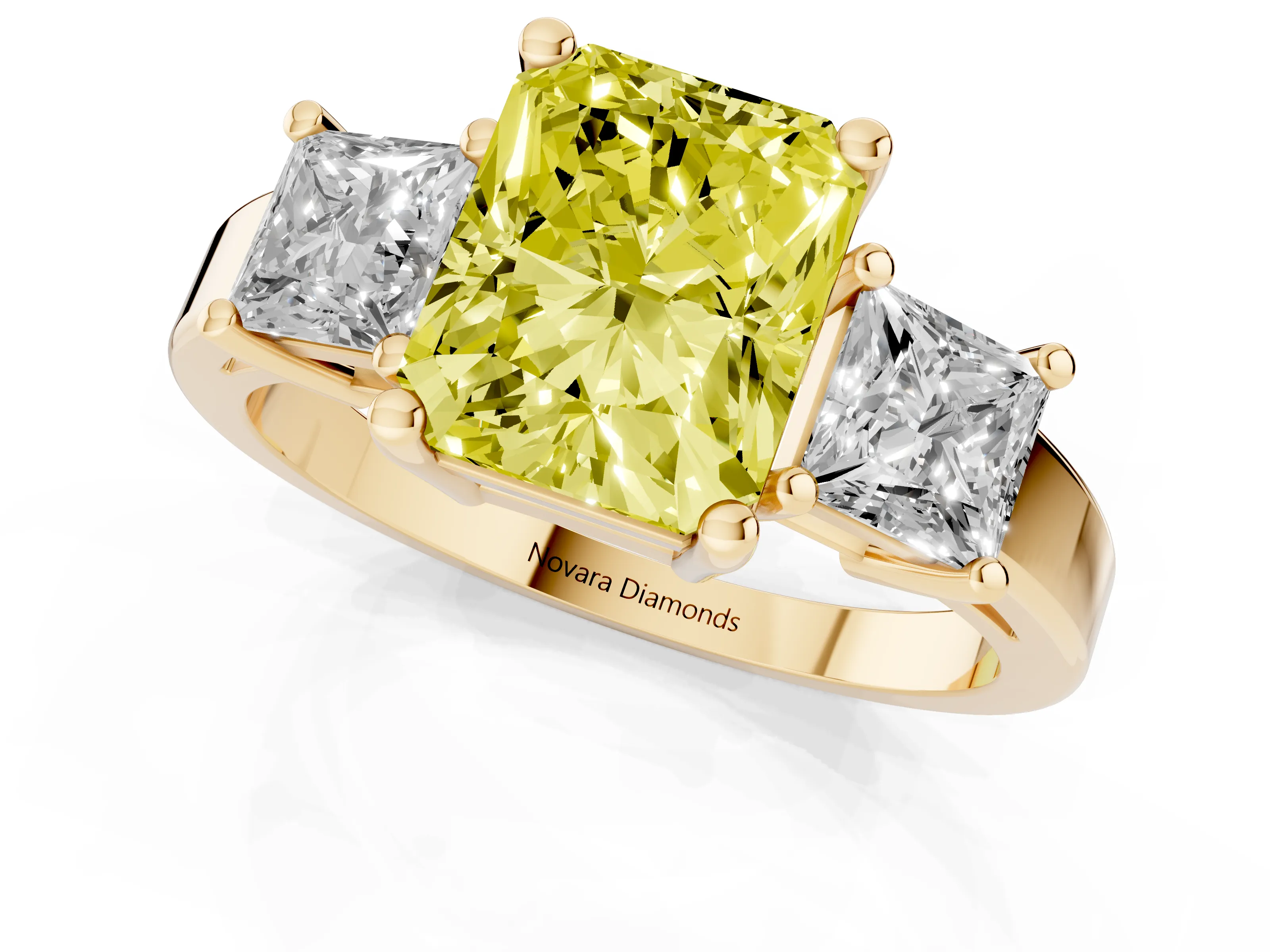 Fancy Yellow Three-Stone Radiant Cut Diamond Solitaire Ring Set in Yellow gold with Prong Setting