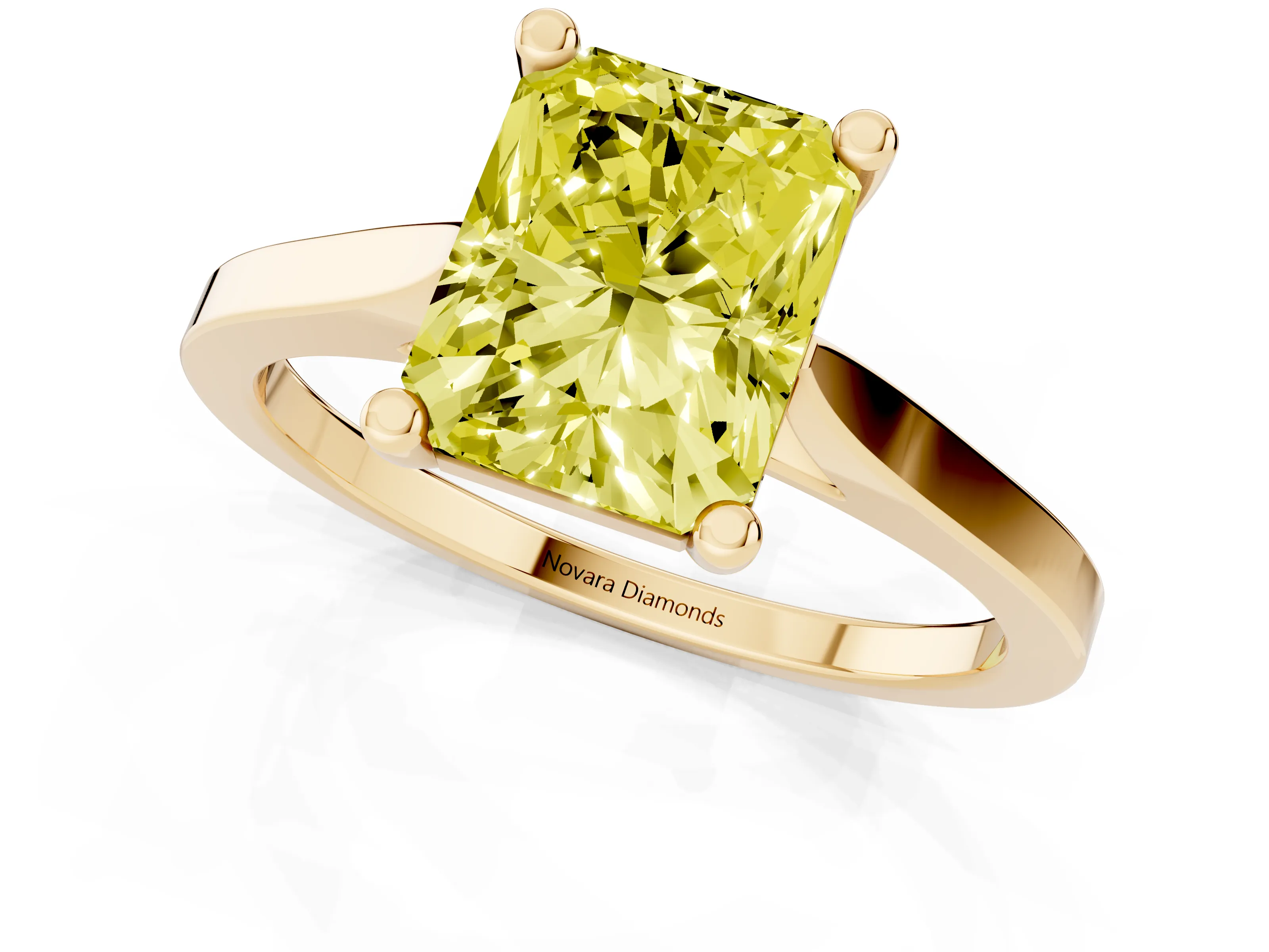Fancy Yellow Radiant Cut Diamond Solitaire Ring Set in Yellow gold with Prong Setting and Tapered Band