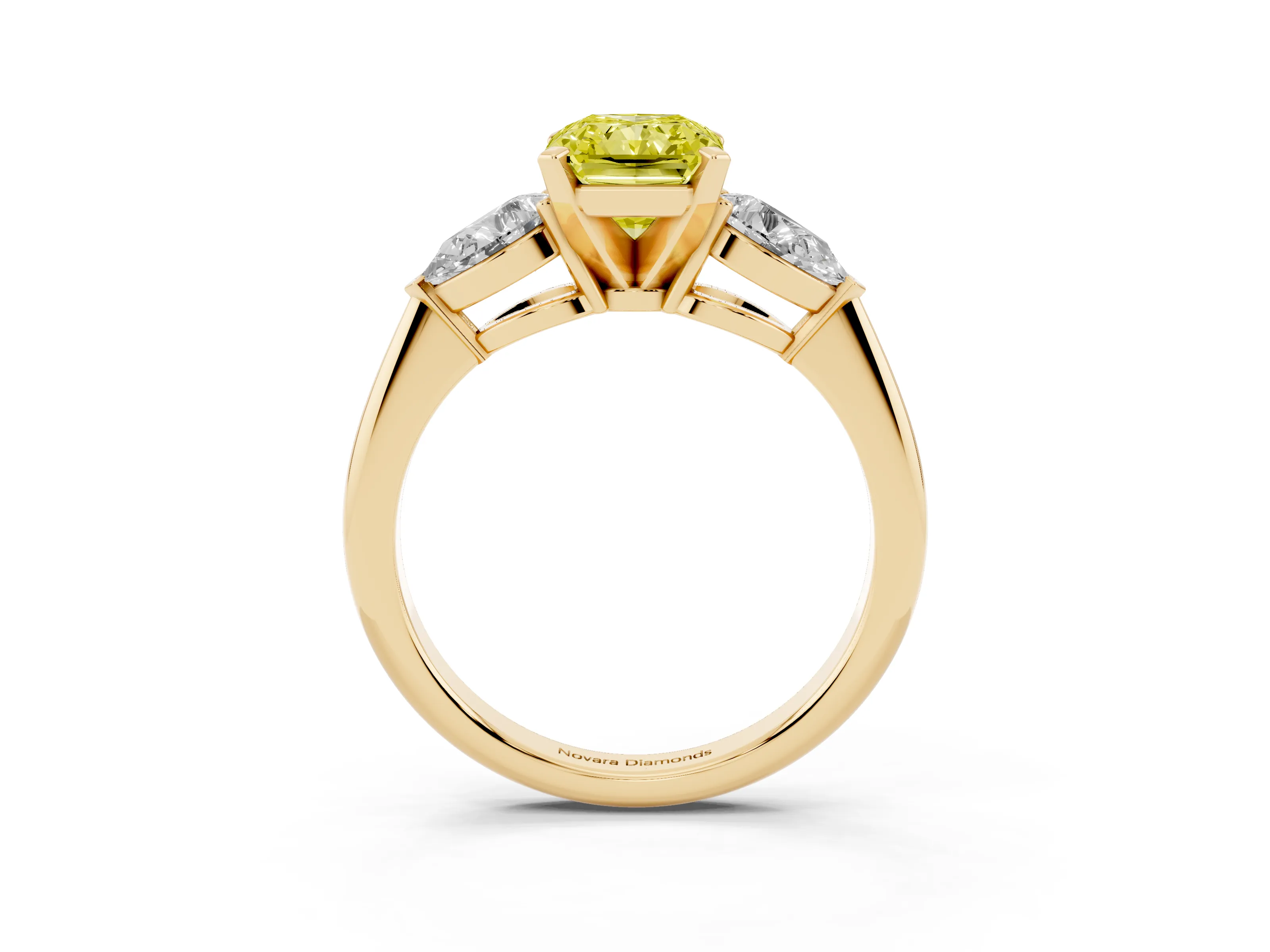 Fancy Yellow Three-Stone Radiant Cut Diamond Ring Set in Yellow gold with Pear Side Stones and Prong Setting