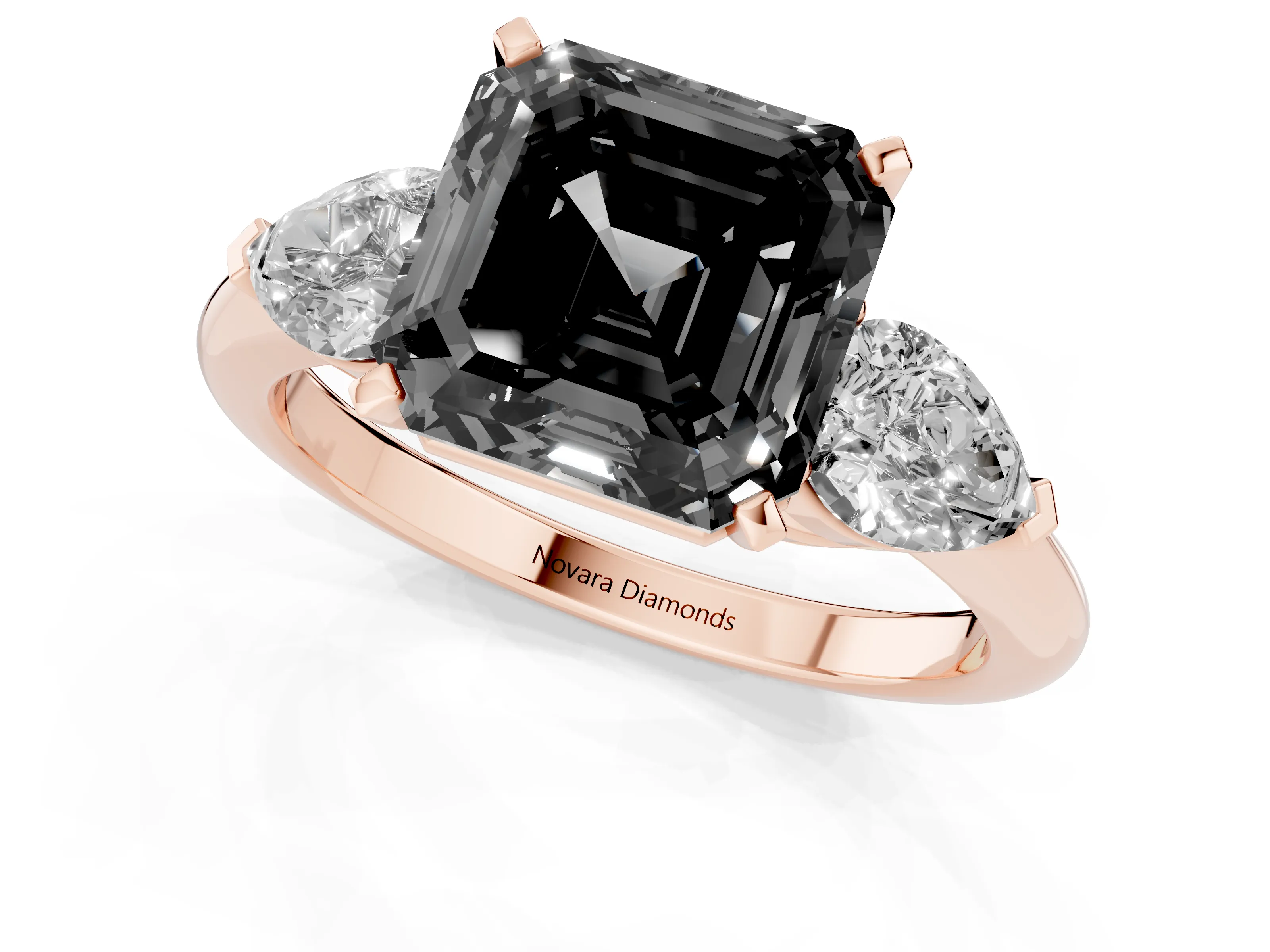 Fancy Black Three-Stone Asscher Cut Diamond Ring Set in Rose gold with Pear Side Stones and Prong Setting