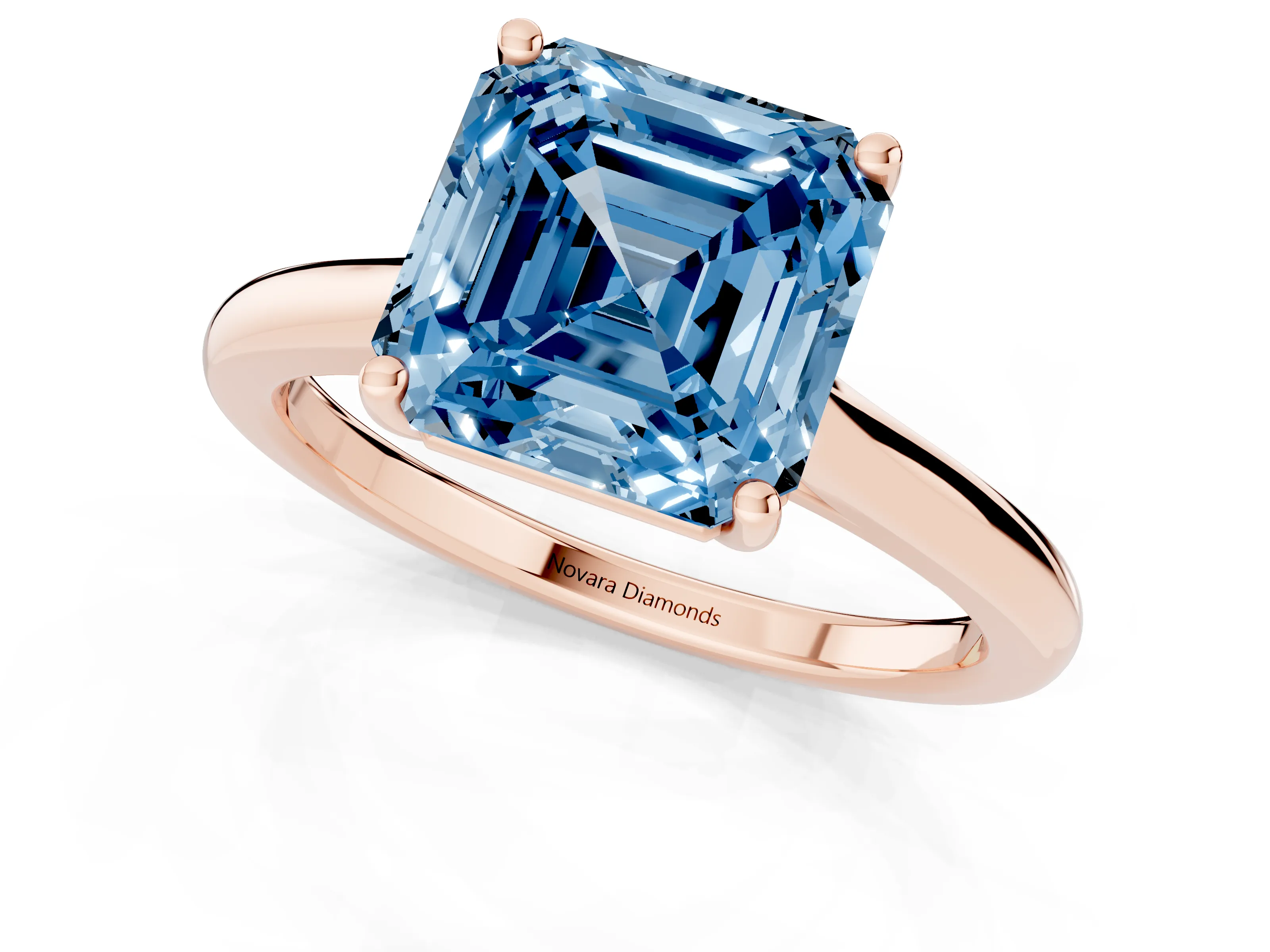 Fancy Blue Asscher Cut Diamond Solitaire Ring Set in Rose gold with Cathedral Band and Prong Setting